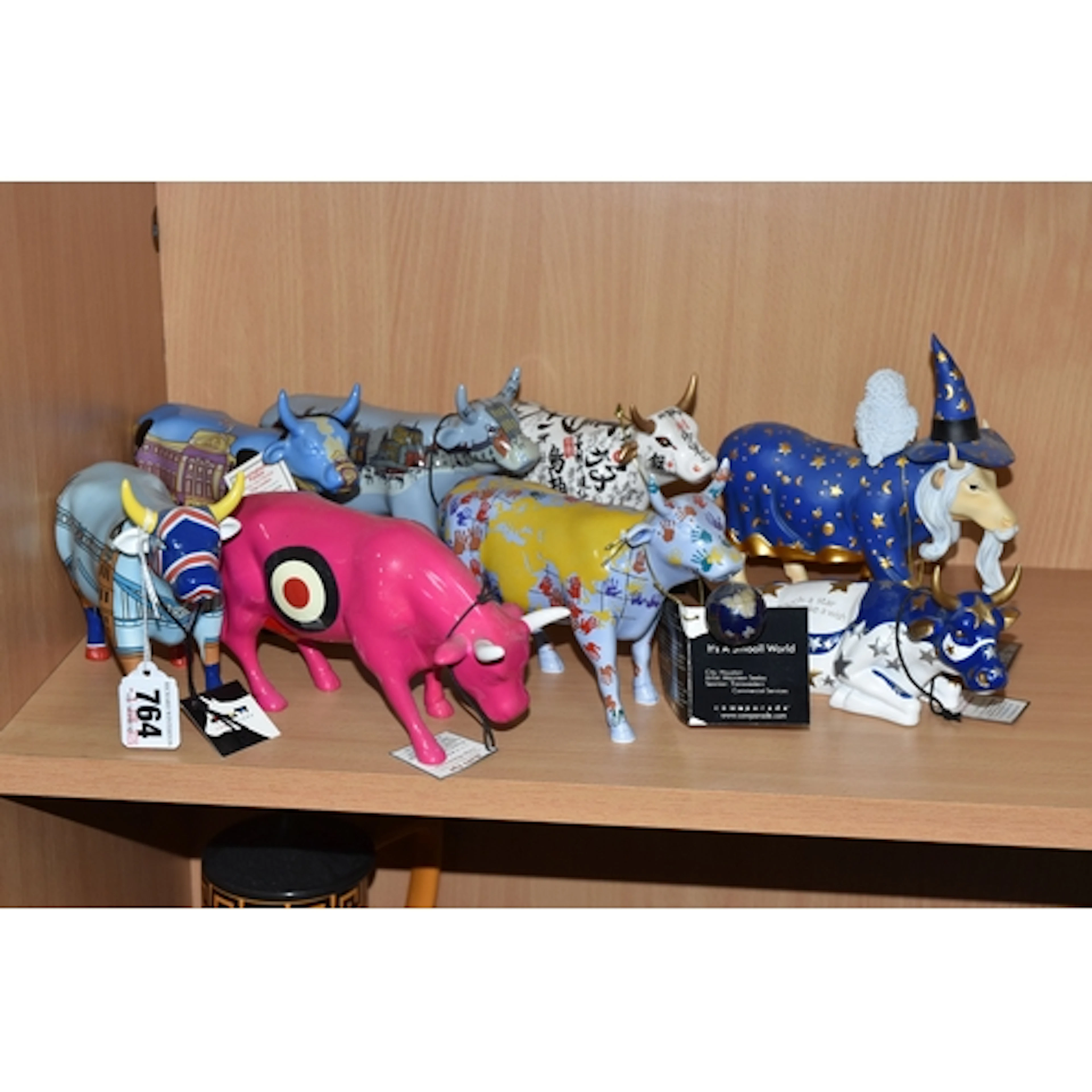 EIGHT COW PARADE SCULPTURES, comprising, no. 6005 Cower Brid...