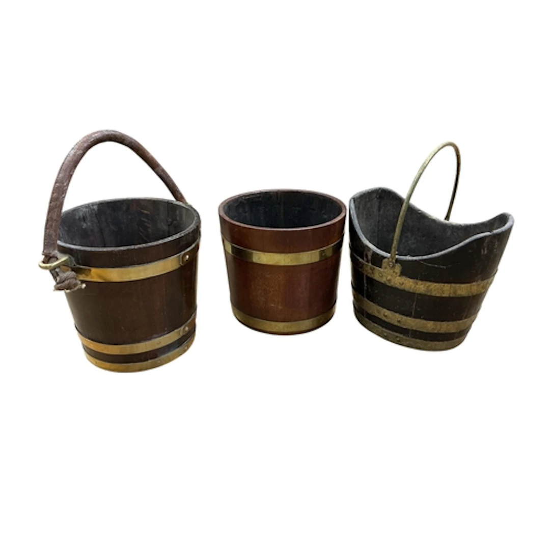 A Victorian brass bound staved oak bucket with leather cover...