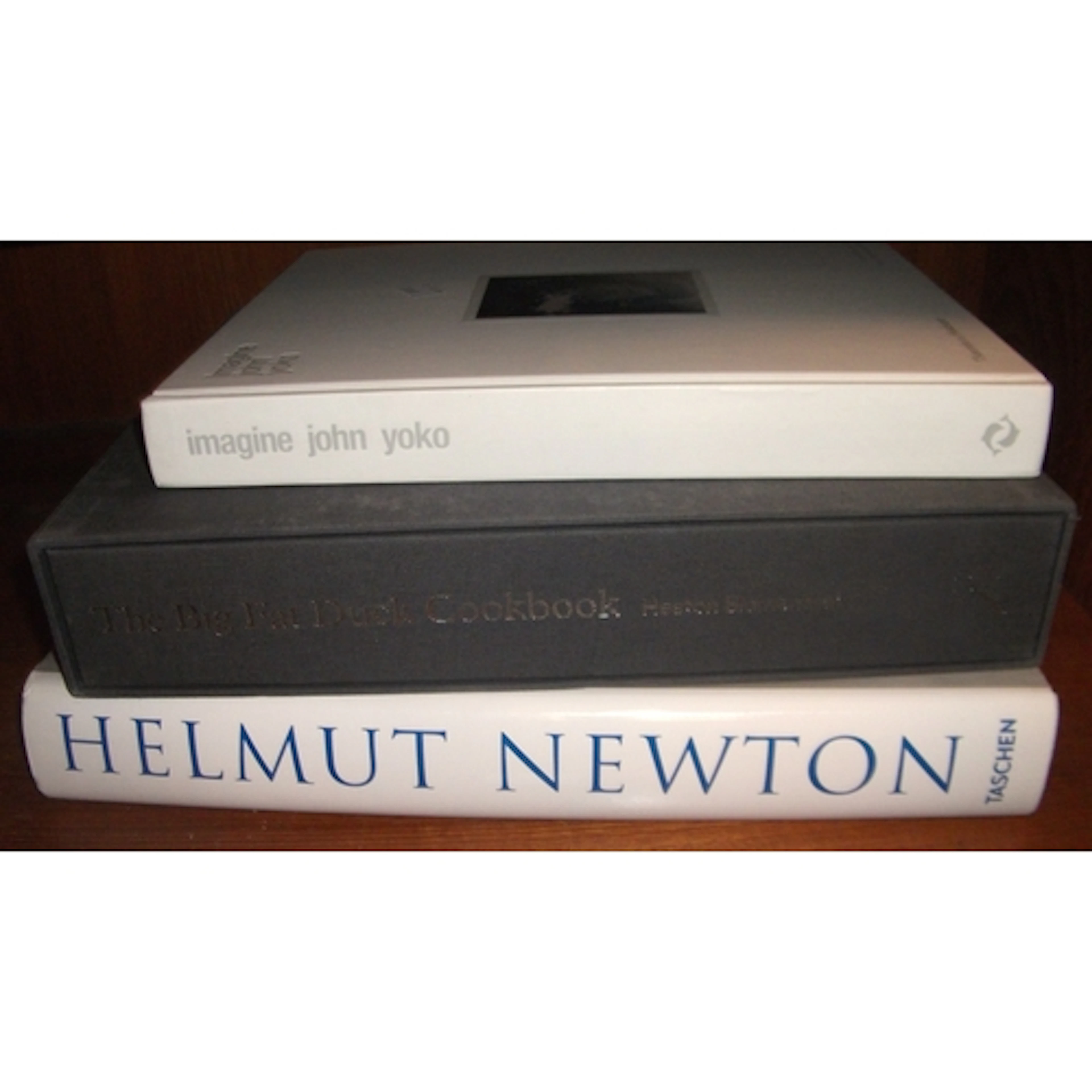 Helmut Newton, one volume with dust jacket, together with on...