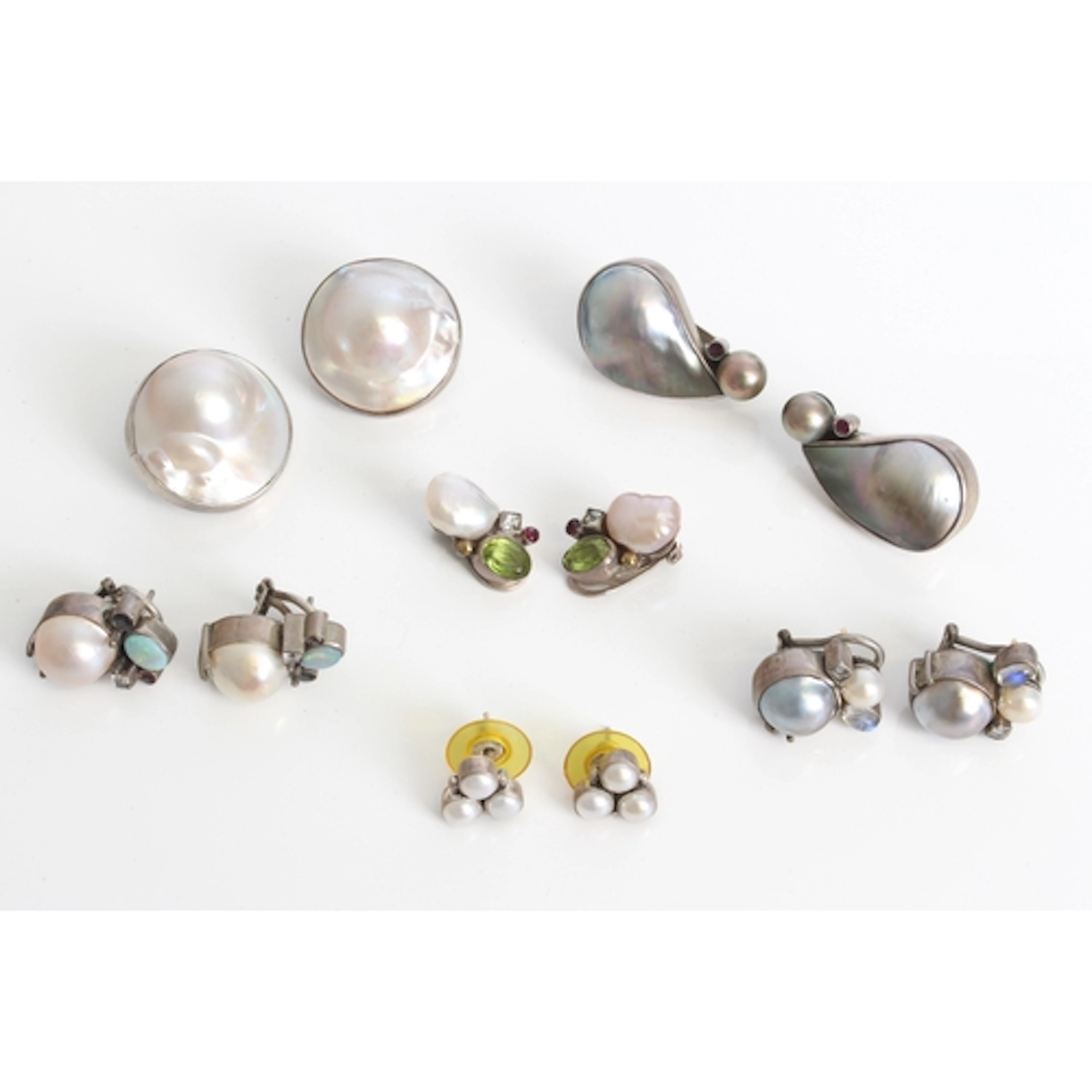 Five pairs of Italian silver, pearl and gemstone earrings by...
