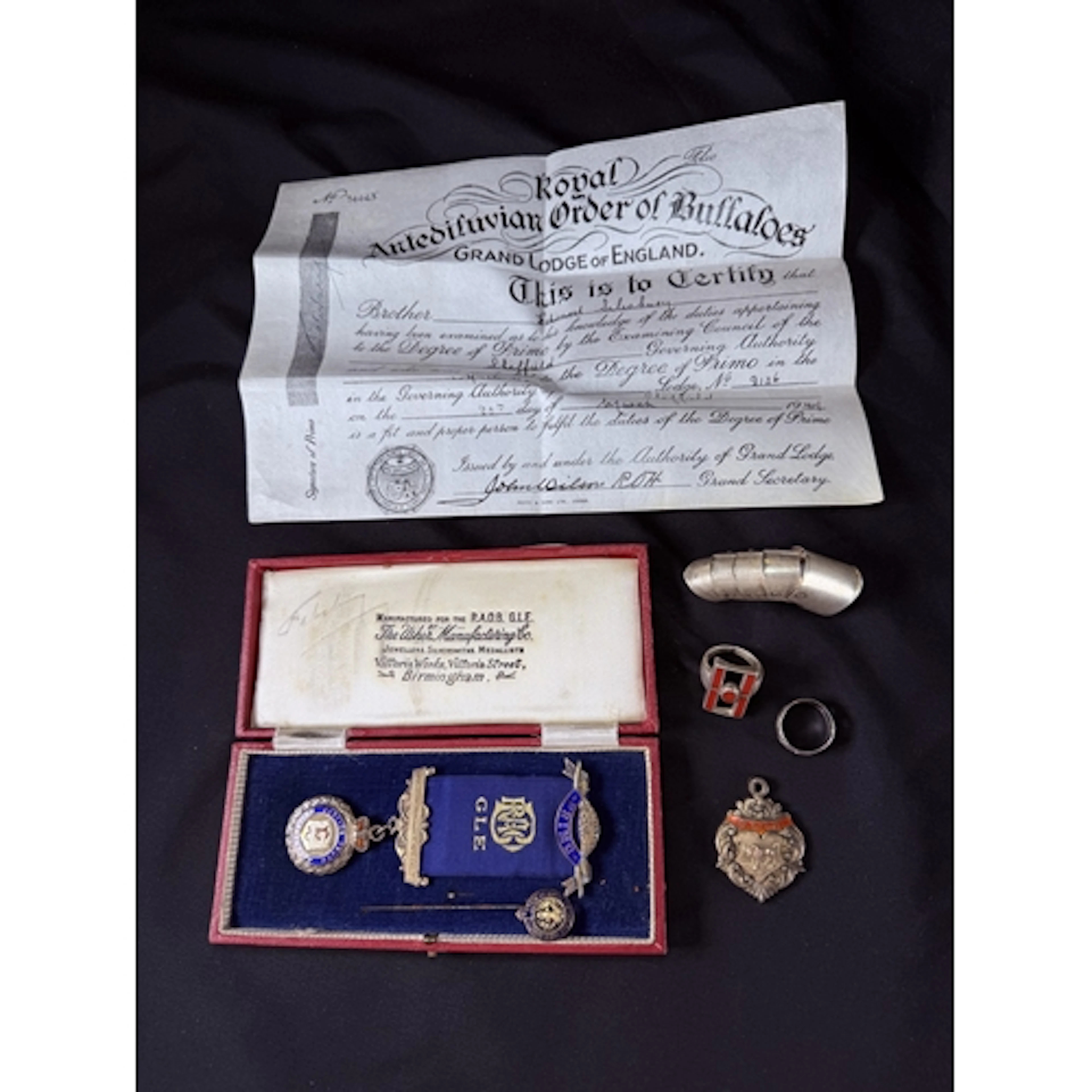 Oder of the buffoes, silver jewells and similar pin cased, a...