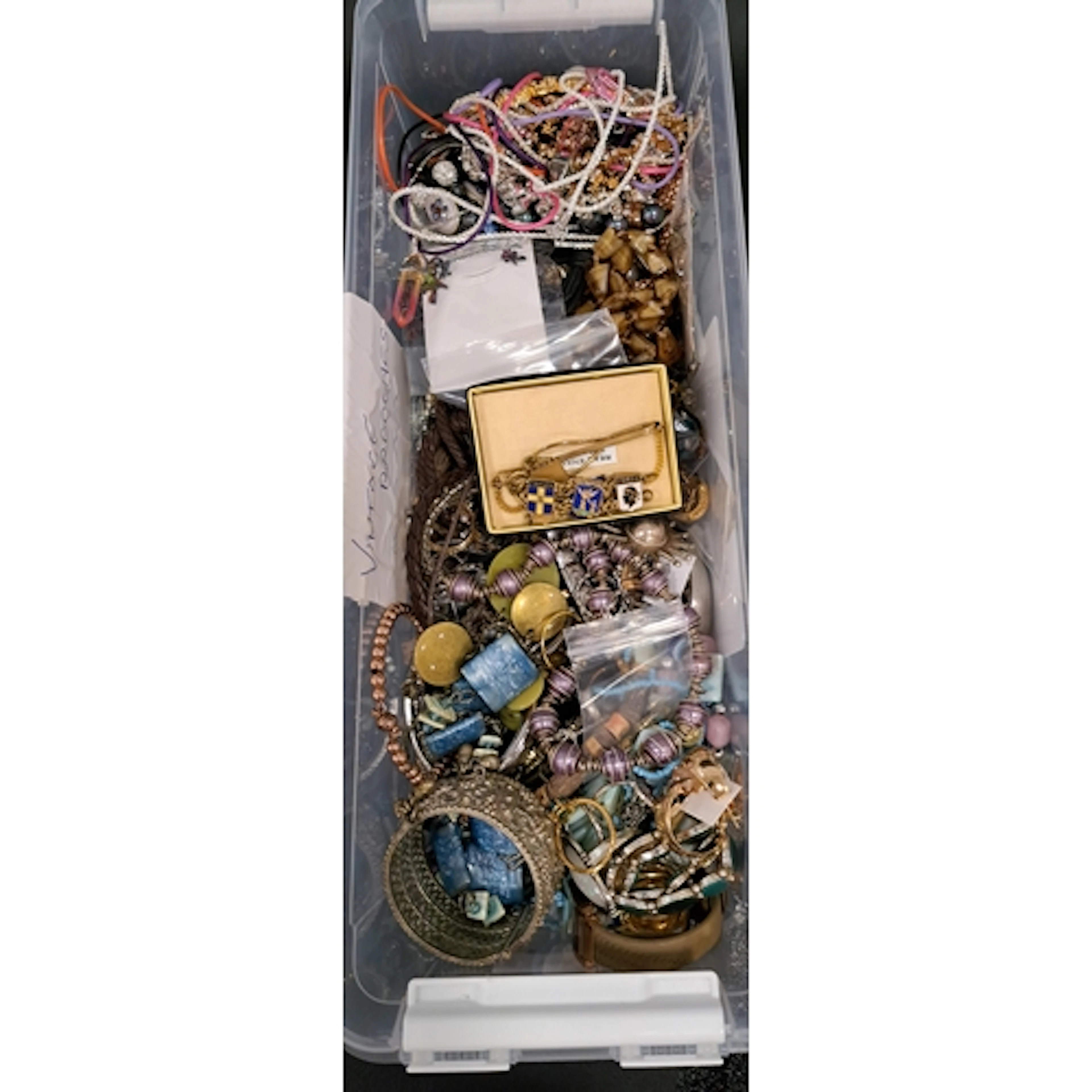 SELECTION OF COSTUME JEWELLERY including an enamel decorated...