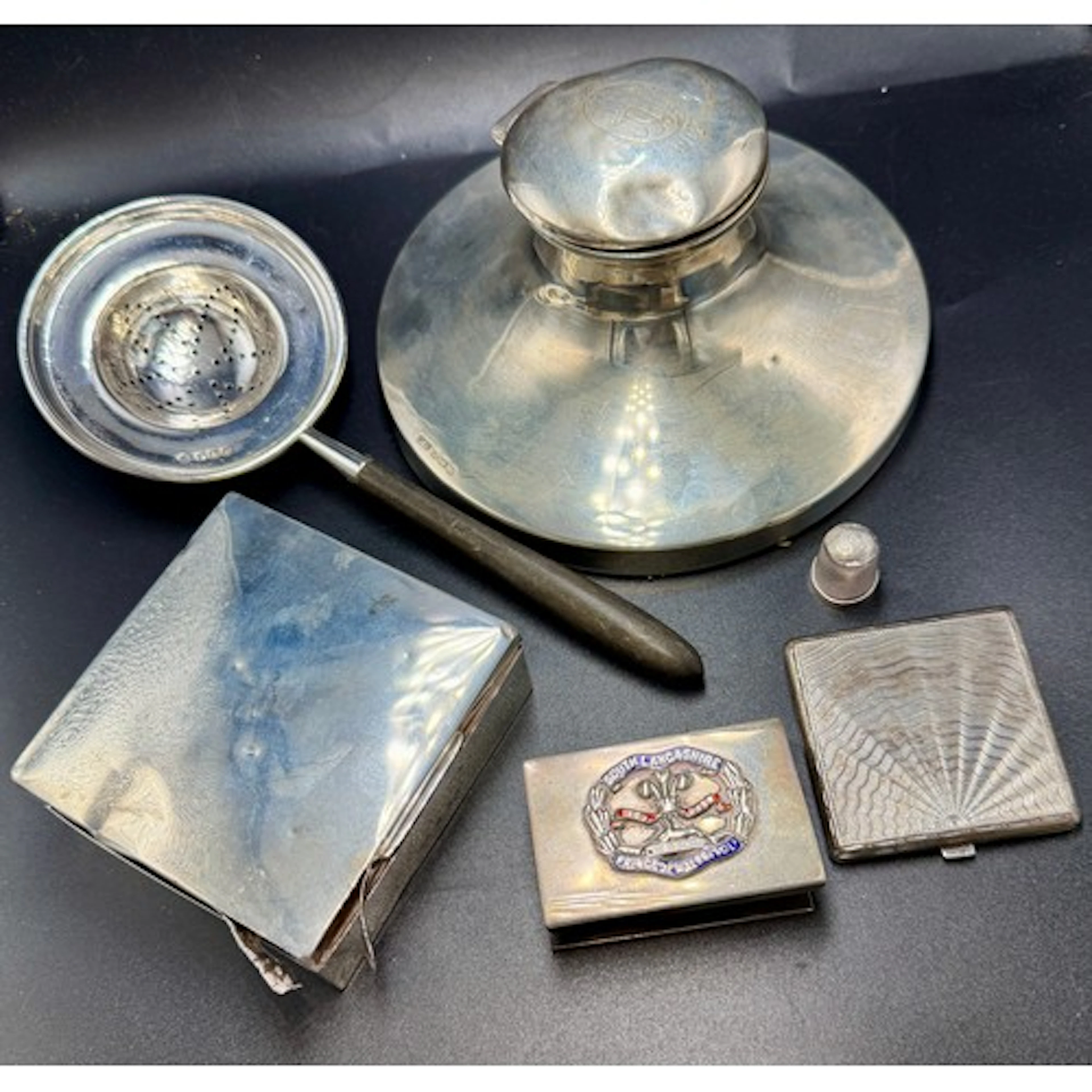 Hallmarked silver to include capstan inkwell, cigarette box,...