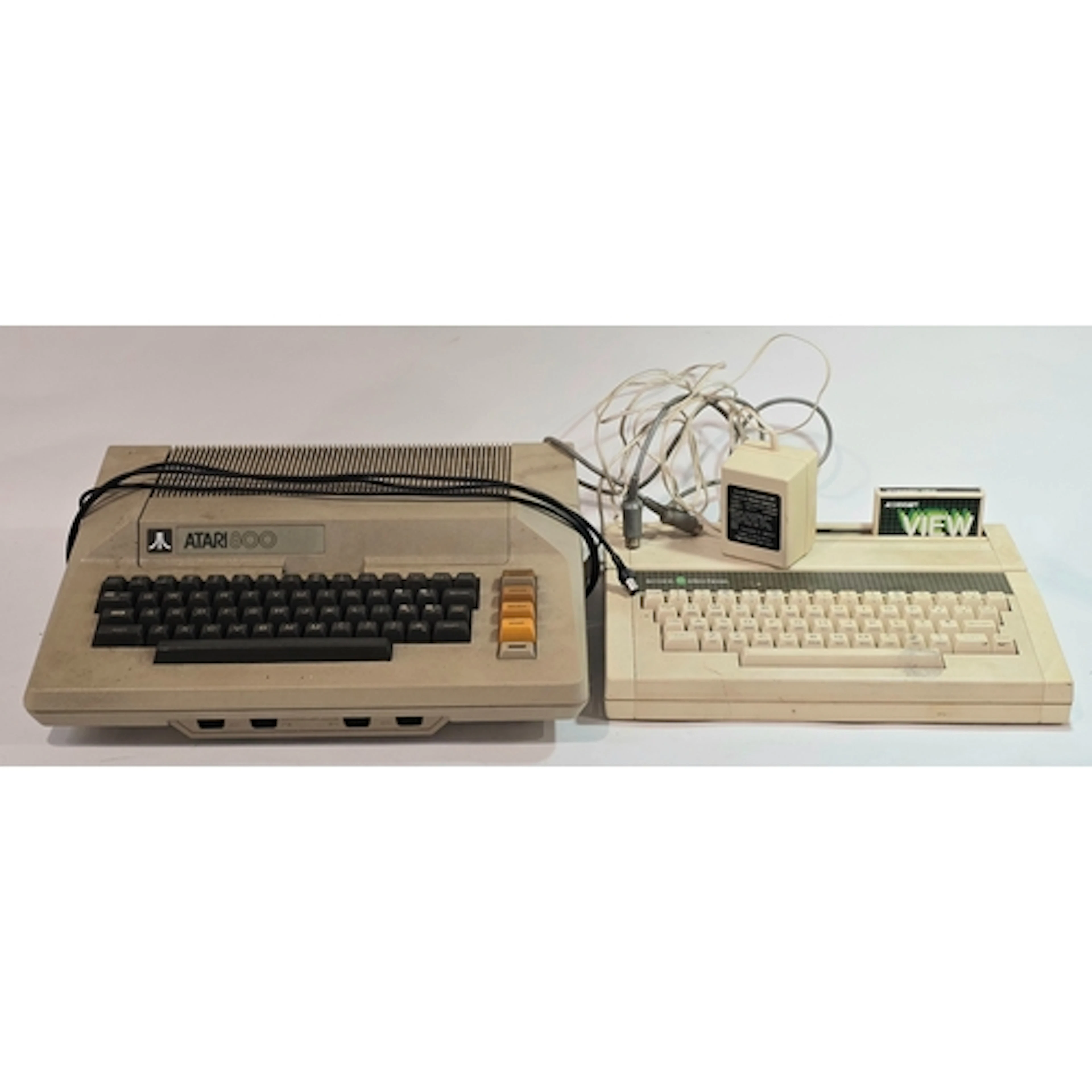 A vintage Atari 800 computer together with an Acorn Electron...