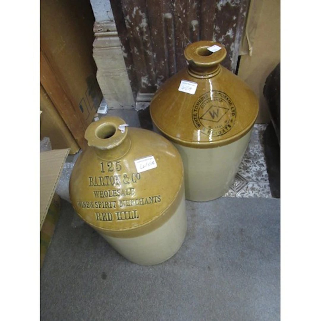 Two stoneware flagons for Barton and Company, Redhill and Wh...