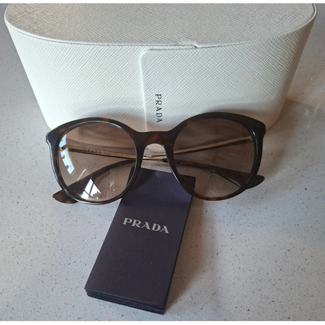 Prada- A pair of dark Havana 2AU-3D0 tortoiseshell style fra...