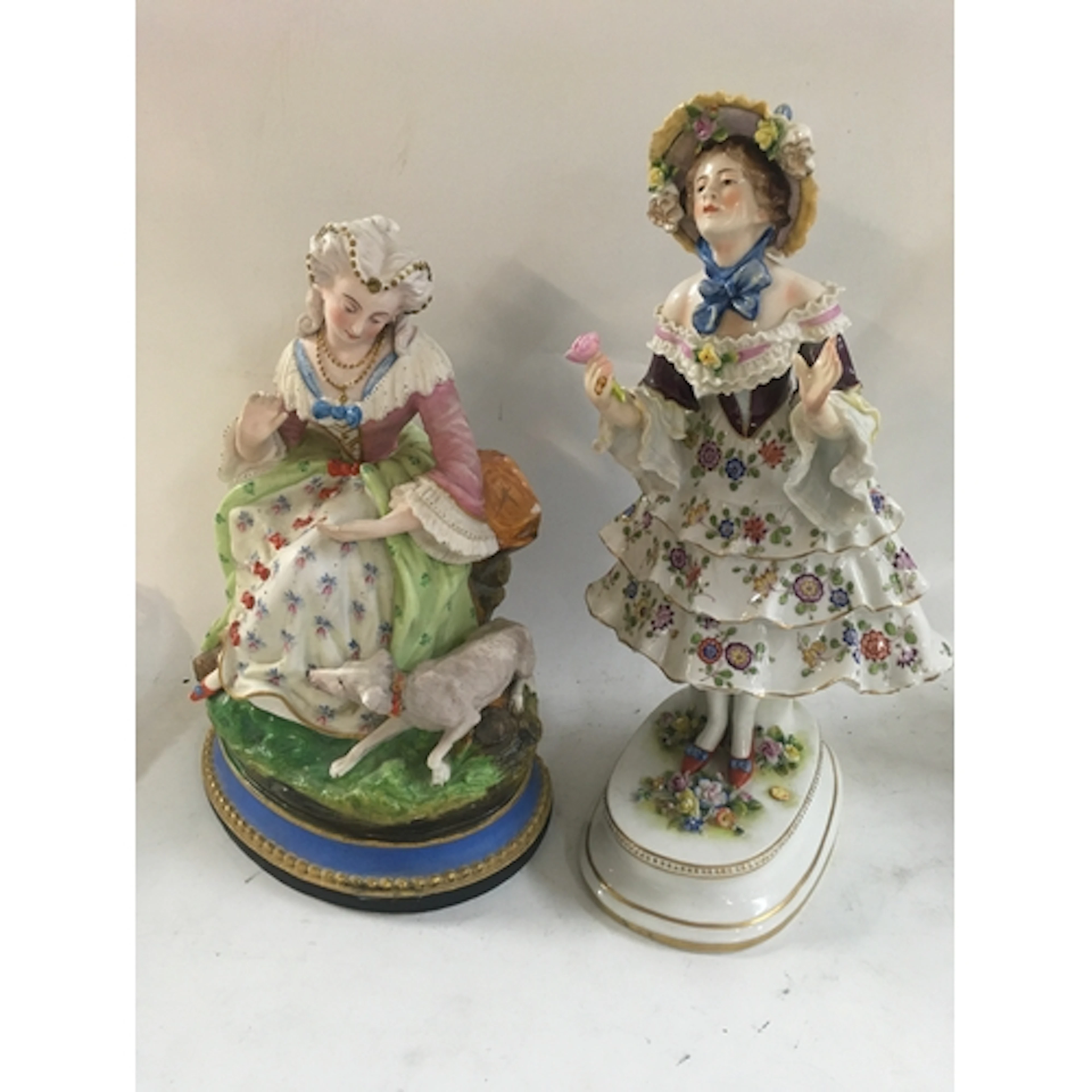 An antique glazed Capodimonte figure, Height 28cm. A bisque ...