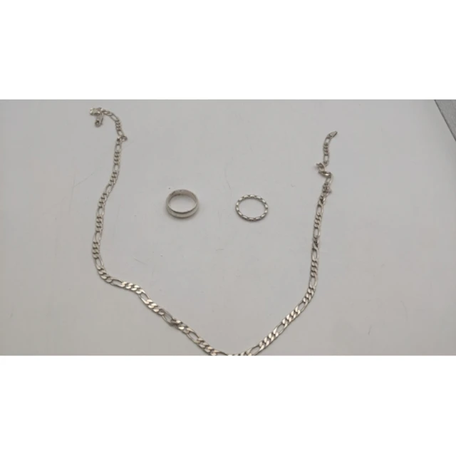 Silver jewellery to include a wedding band, an eternity band...