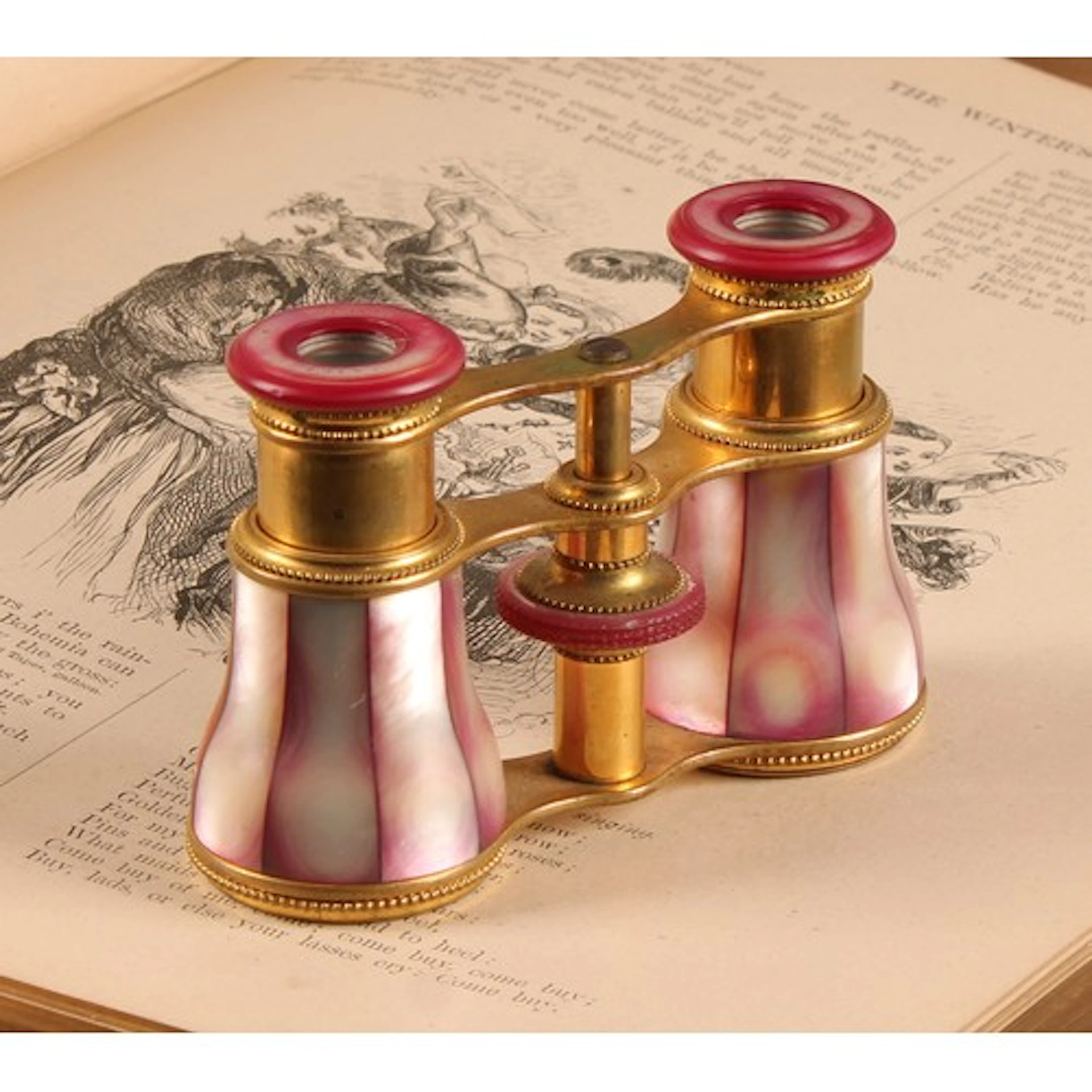 A pair of 19th century French pink mother-of-pearl opera gla...