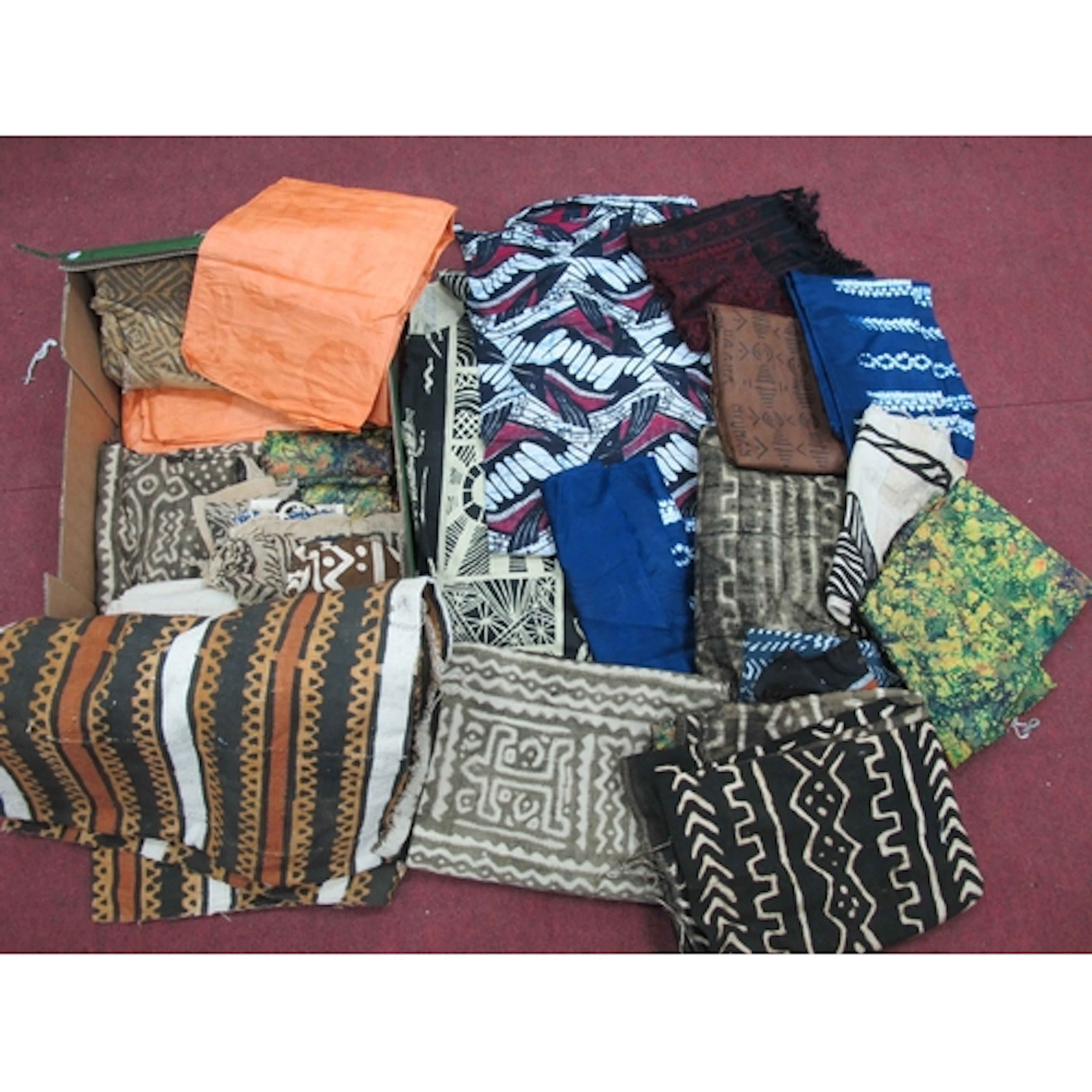 A Quantity of North West African Tribal Printed Fabrics, mai...