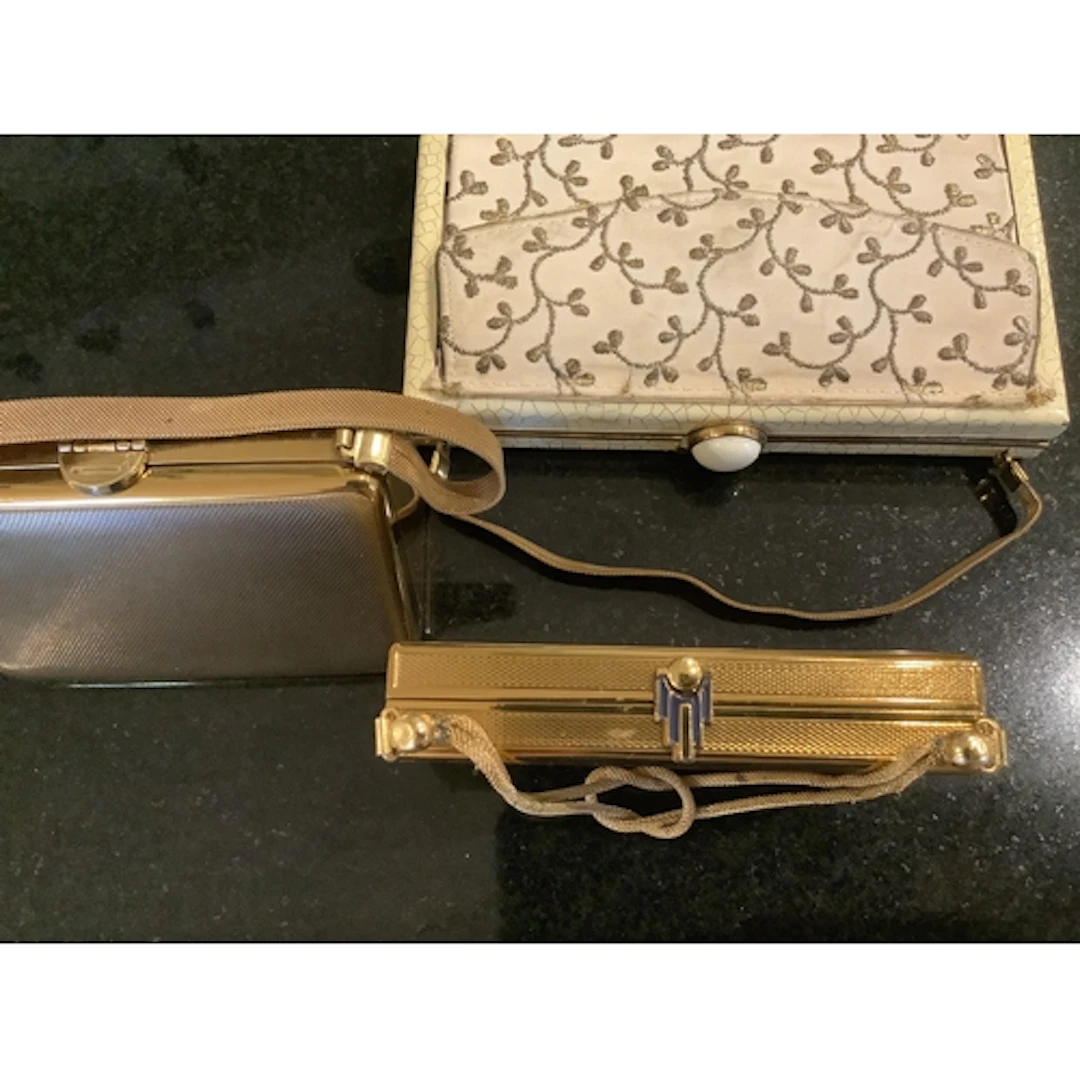 Three 1930's-40's ladies evening Minaudières. One a metal ha...