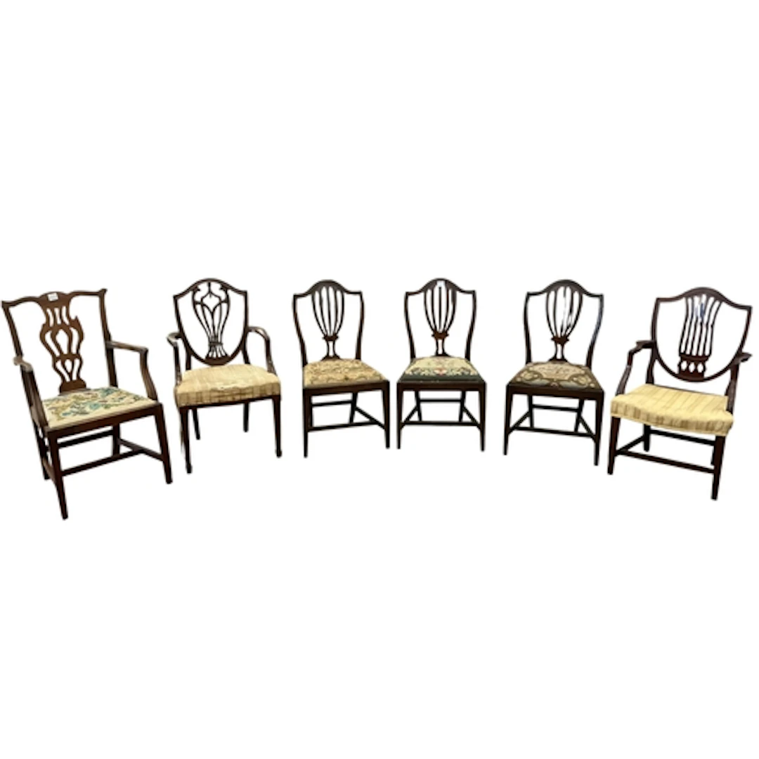 A harlequin set of six mahogany dining chairs (three with ar...