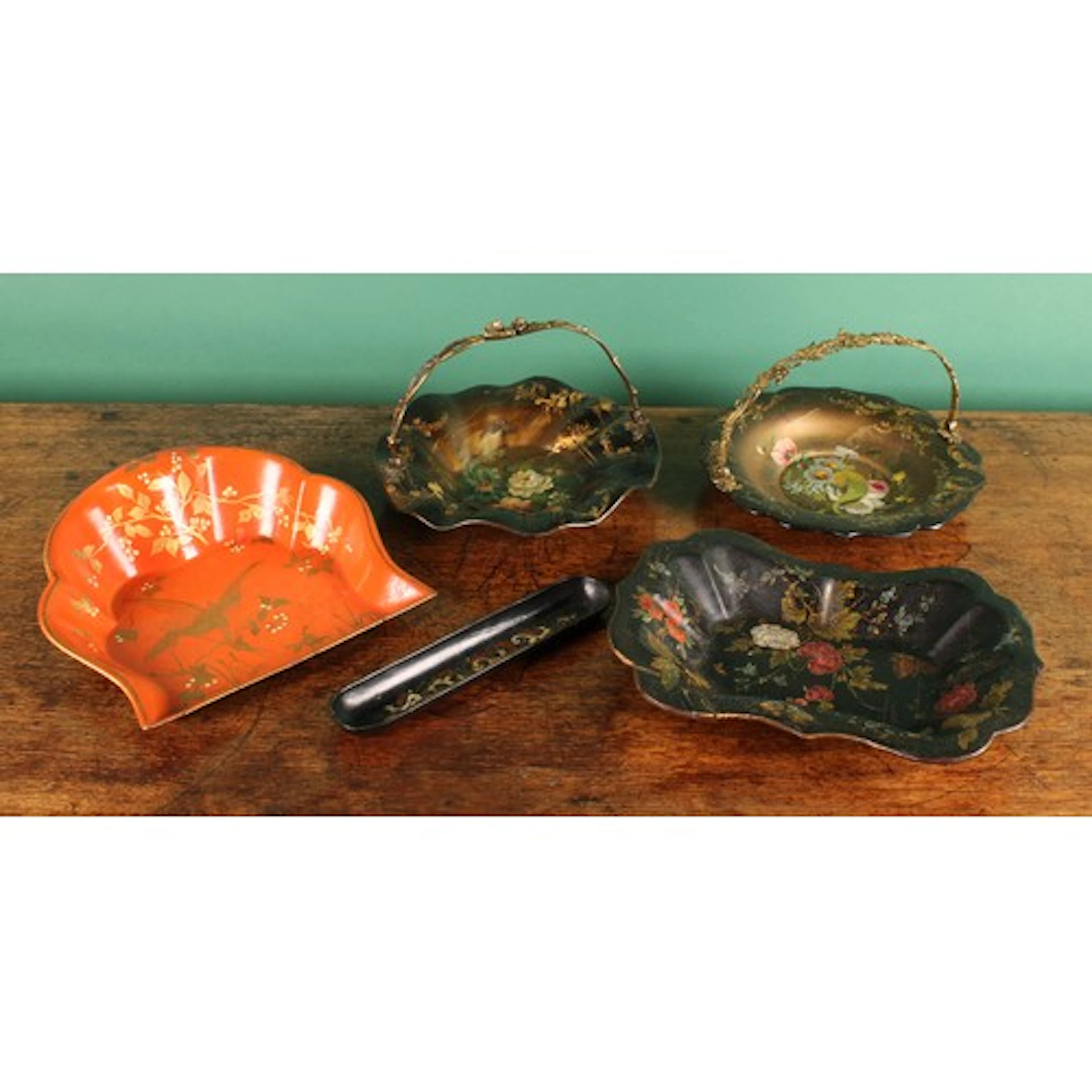 A Victorian papier mache shaped circular swing handled dish,...