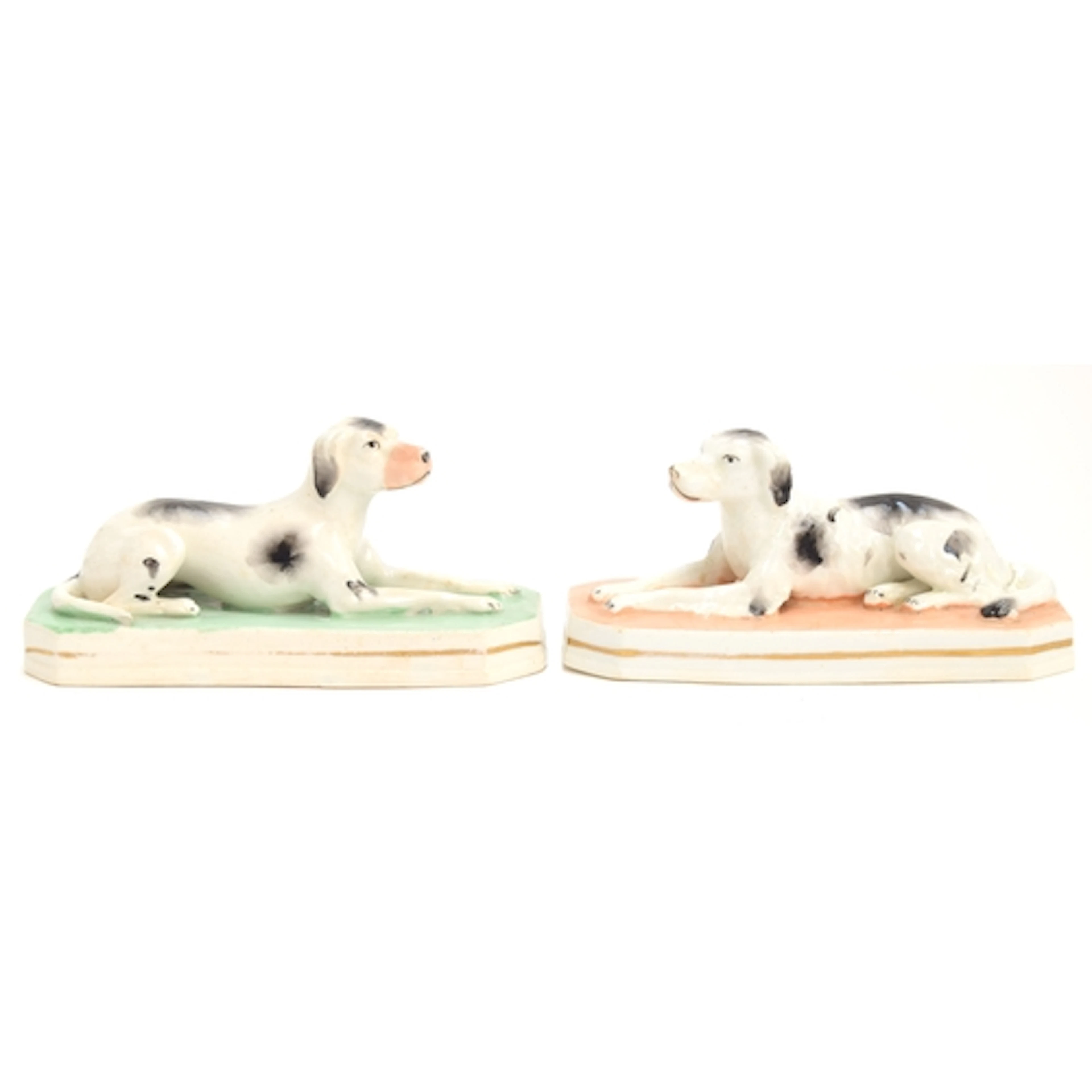 A pair of 19th century Staffordshire porcelain figures of re...
