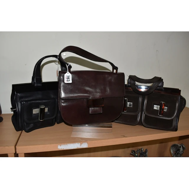 THREE VINTAGE DESIGNER HANDBAGS, comprising Prada 1996, brow...