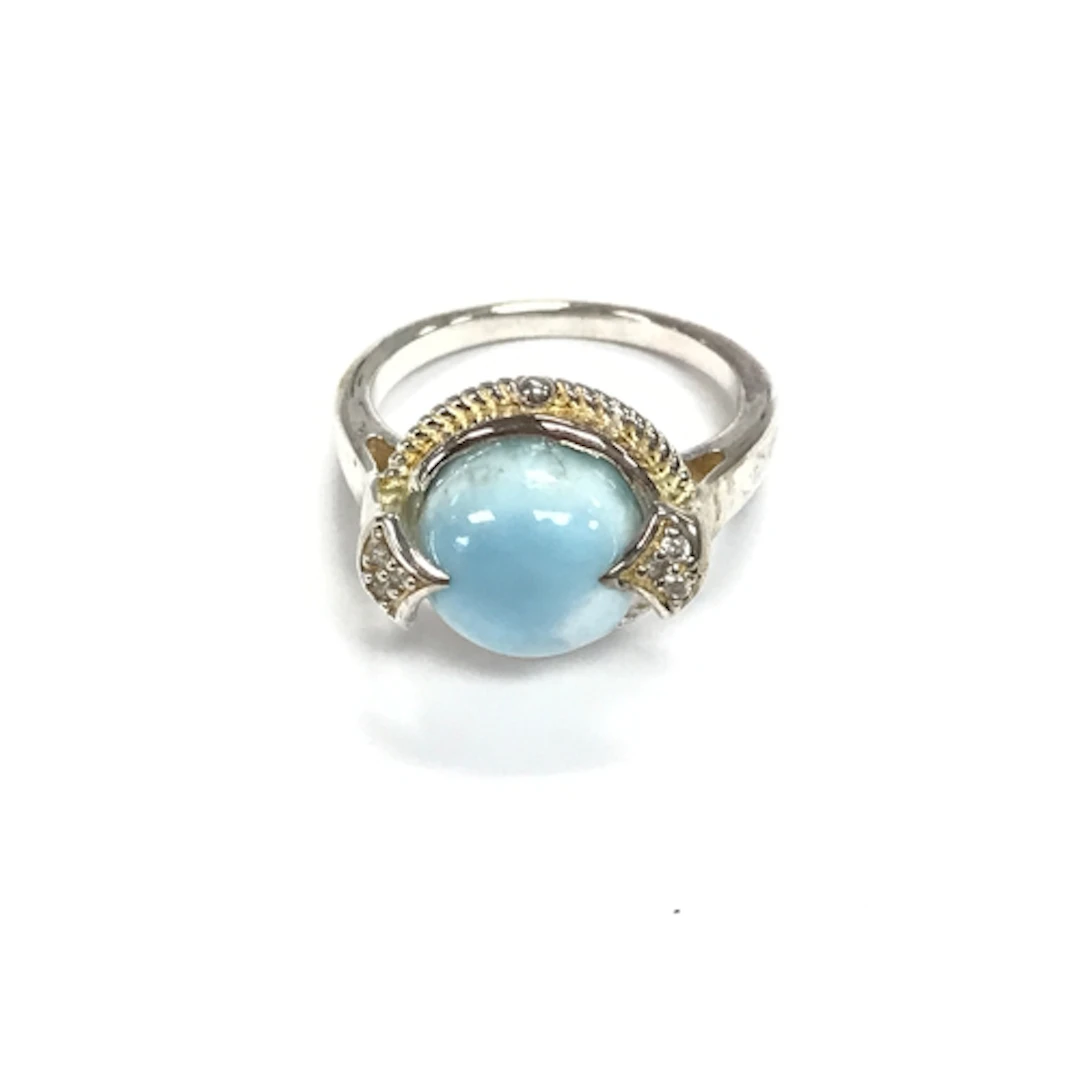 A silver ring set with a round Larimar. Size N 1/2 NO RESERV...