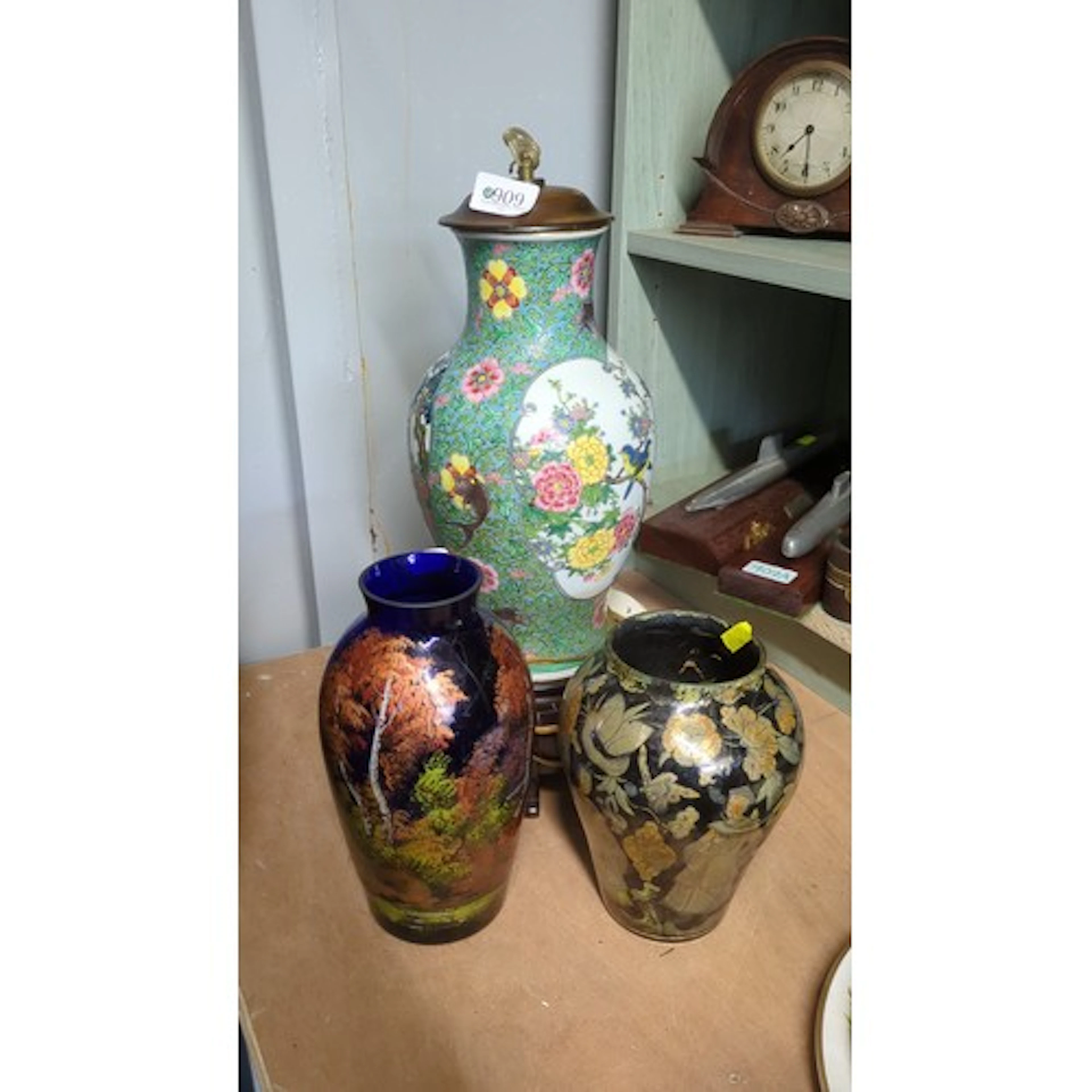 A group of decorative ceramics and glass, comprising a clois...
