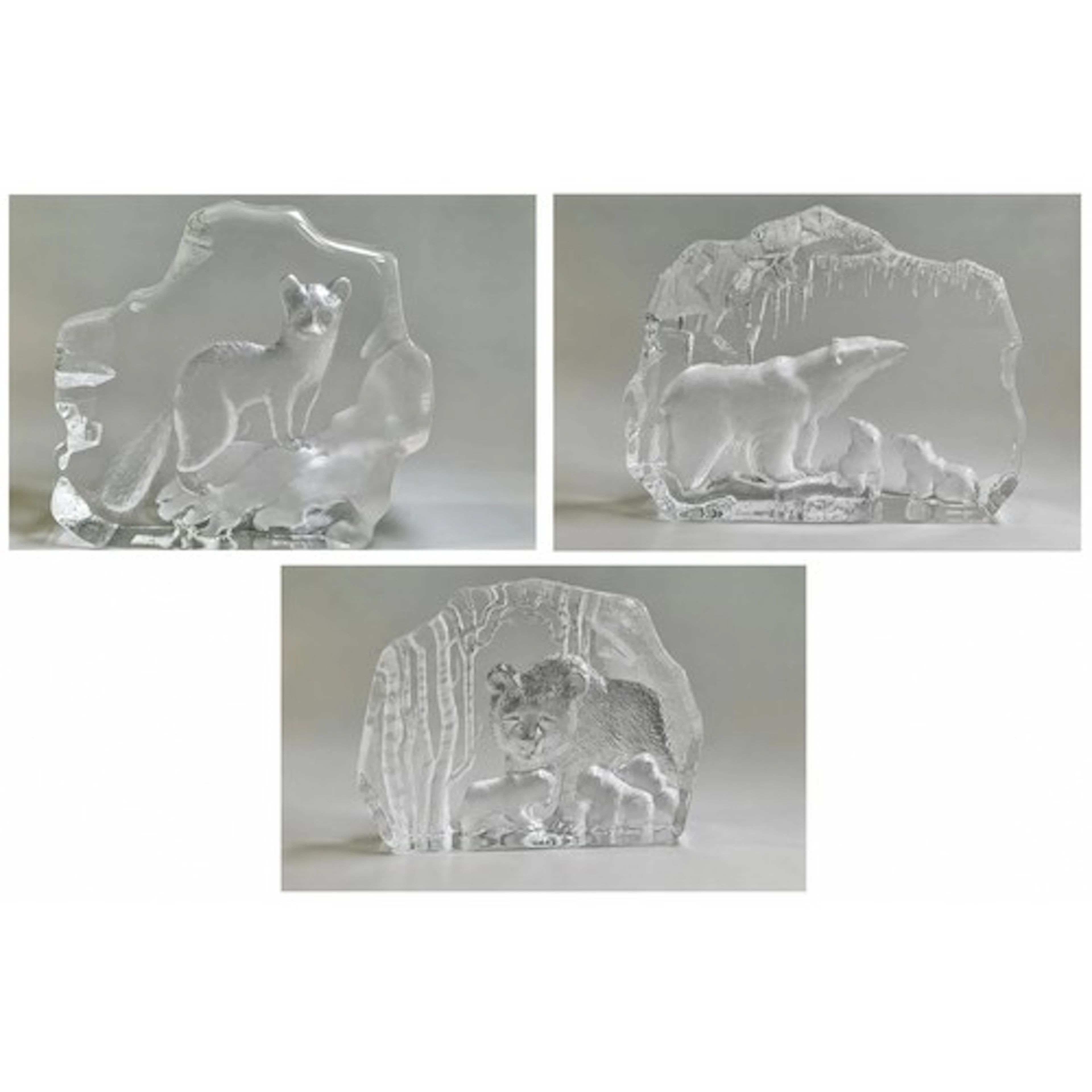 Mats Jonasson, three lead crystal block paperweight sculptur...