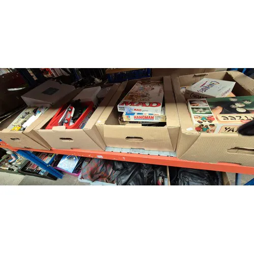 A box of assorted vintage board games together with a box of...
