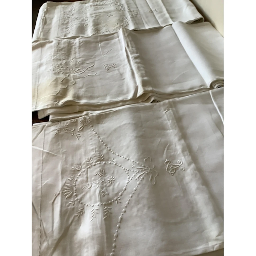 Three Irish linen double sheets, with different embroidery ...