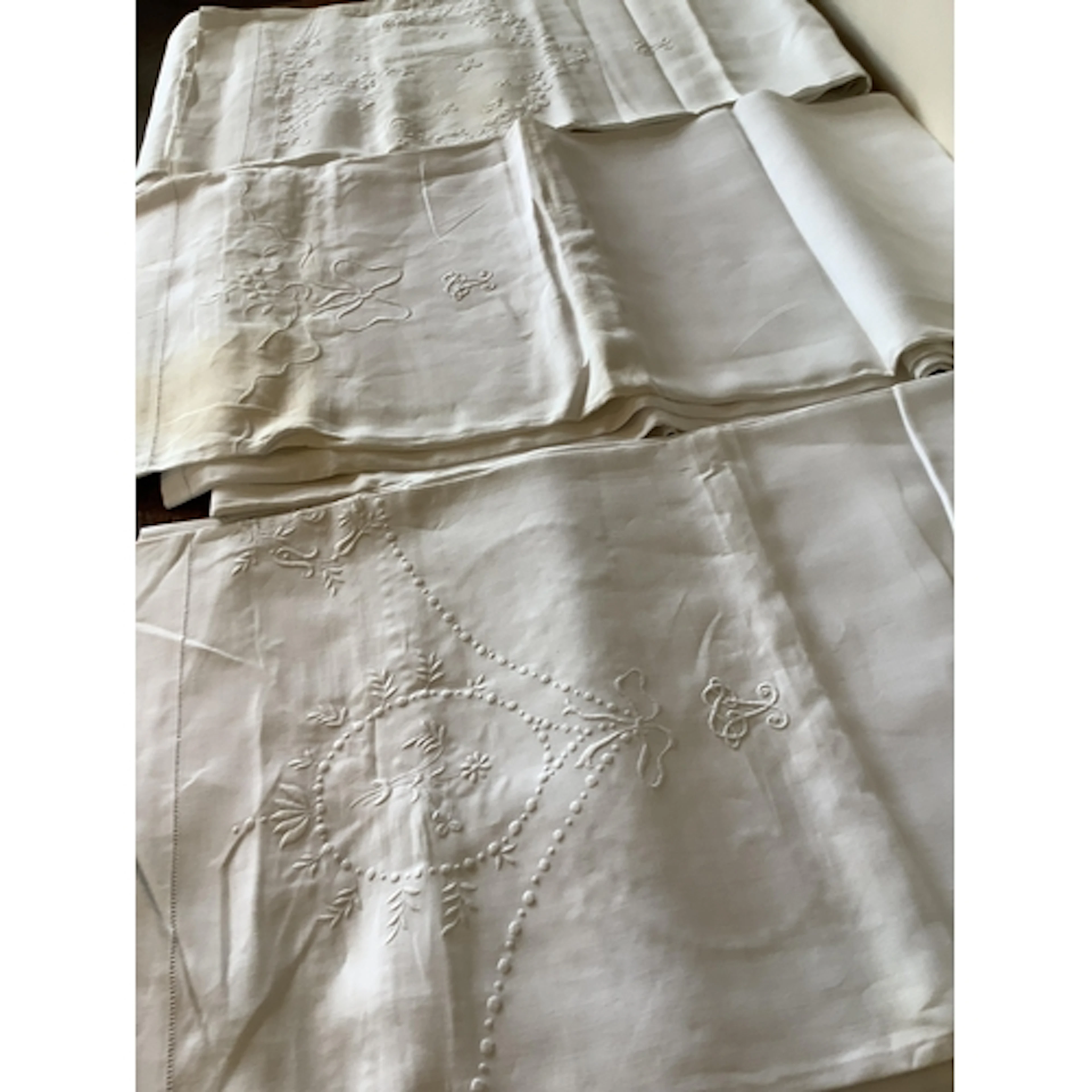 Three Irish linen double sheets, with different embroidery ...
