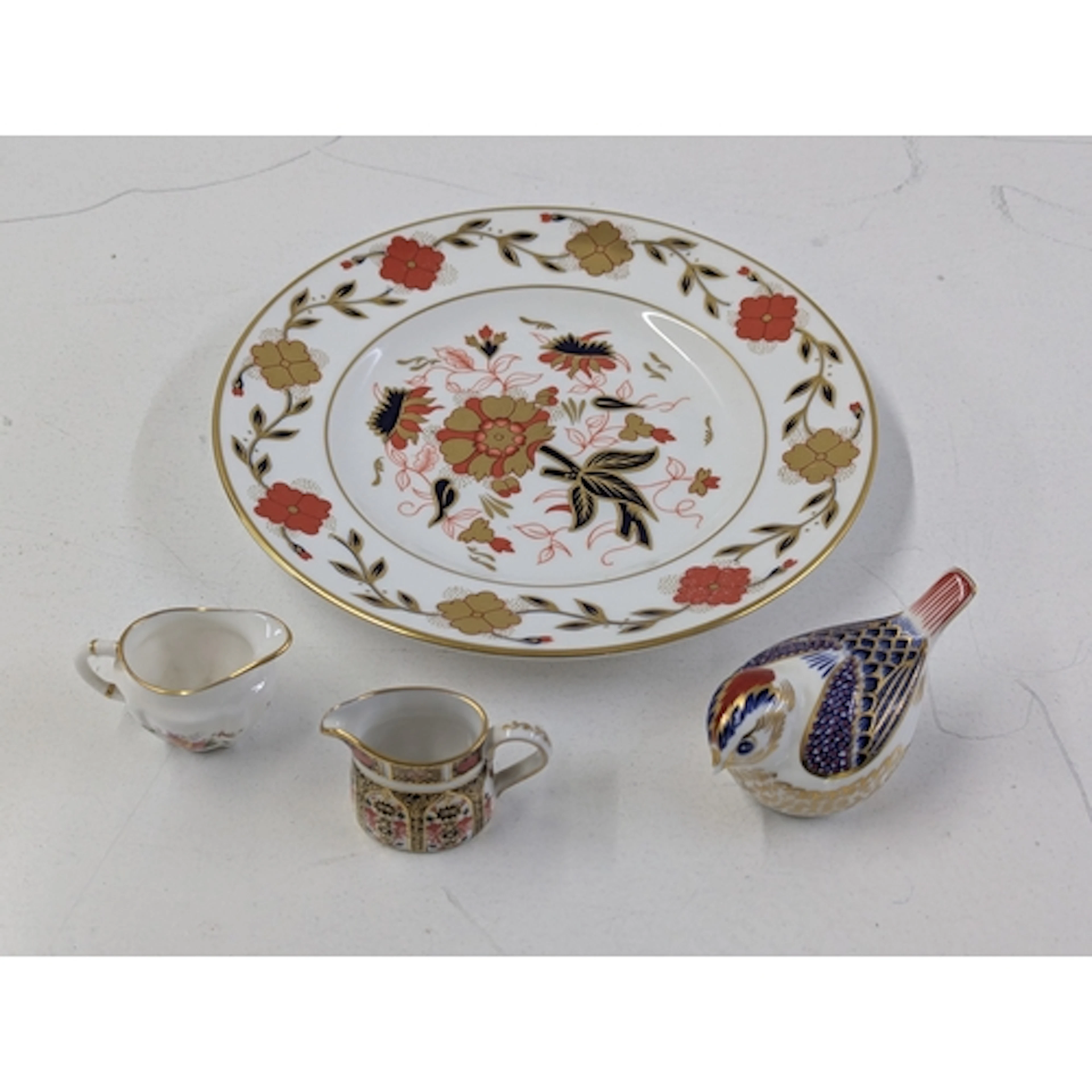 Royal Crown Derby to include a paper weight with a gold topp...