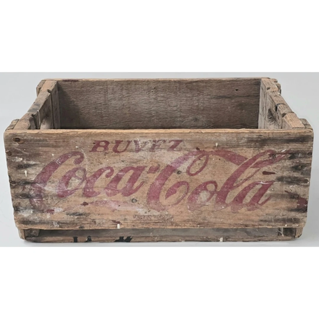 A vintage wooden Coca Cola advertising crate measuring 22x50...
