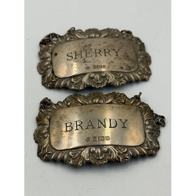Two silver decanter labels 'Brandy' and 'Sherry' hallmarked ...