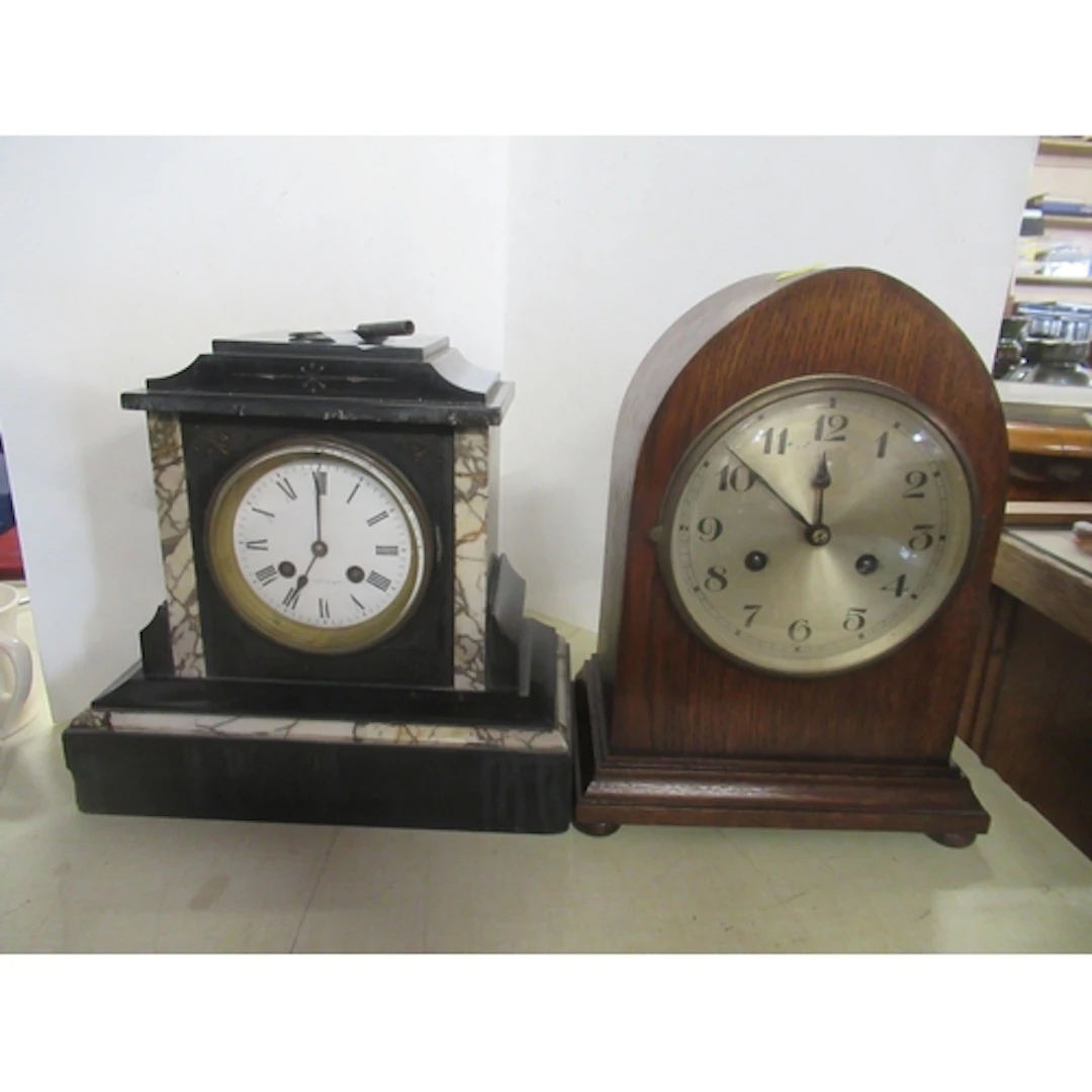 A Victorian slate mantel clock, together with an oak cased m...