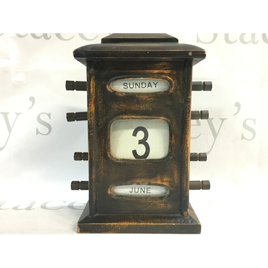A vintage wooden perpetual desk calendar 25cm tall, 15cm wid...