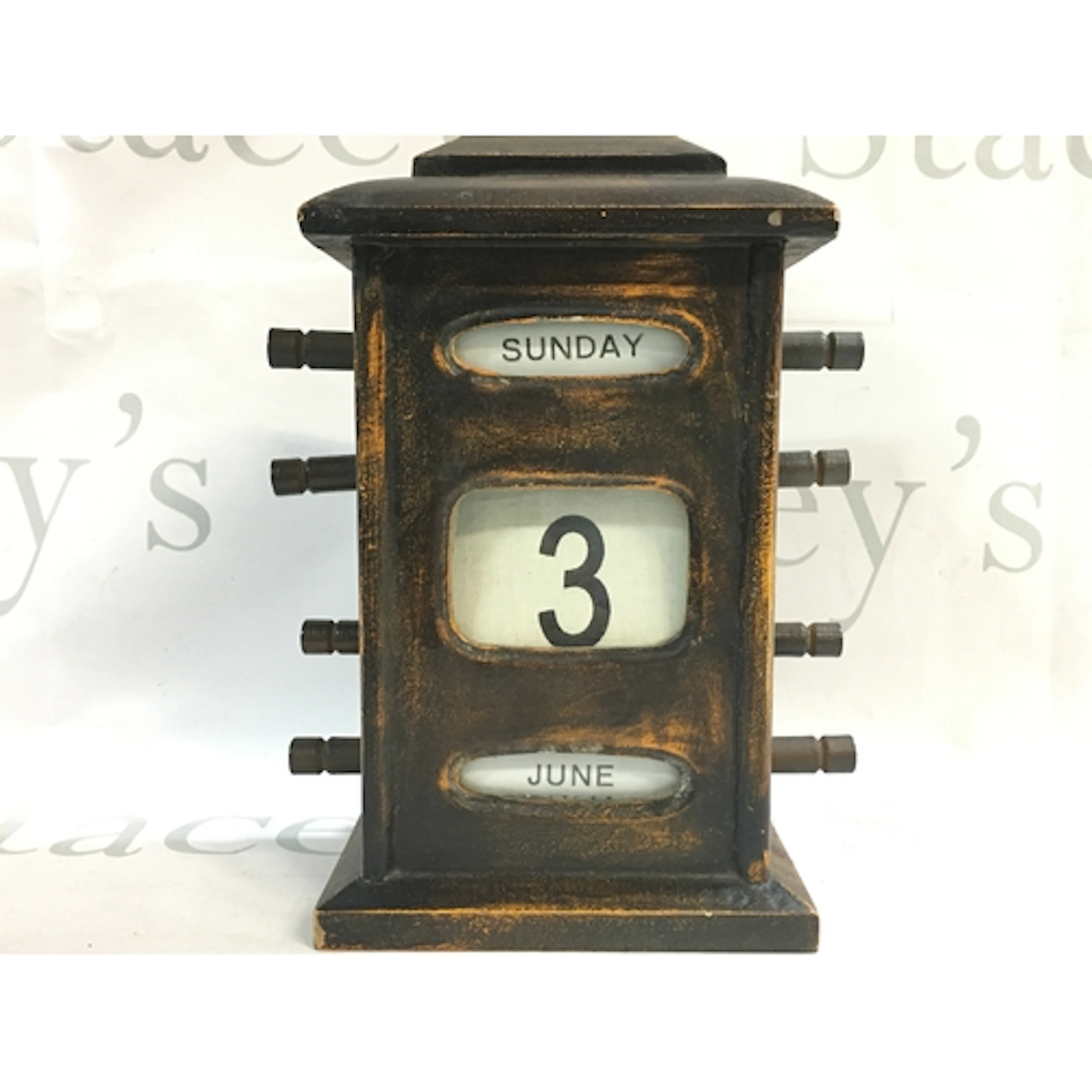 A vintage wooden perpetual desk calendar 25cm tall, 15cm wid...