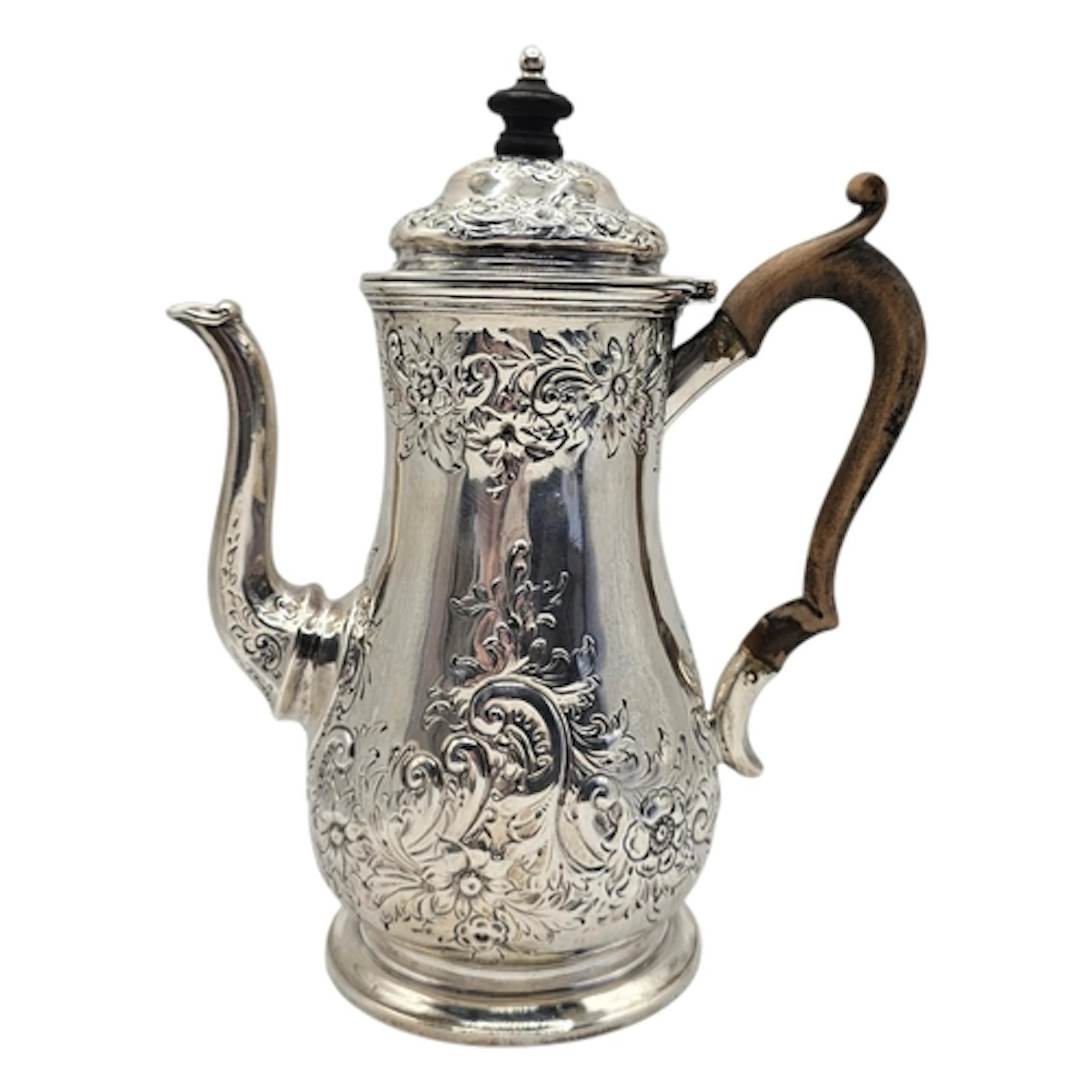 A VICTORIAN SILVER COFFEE POT Georgian design, with carved w...