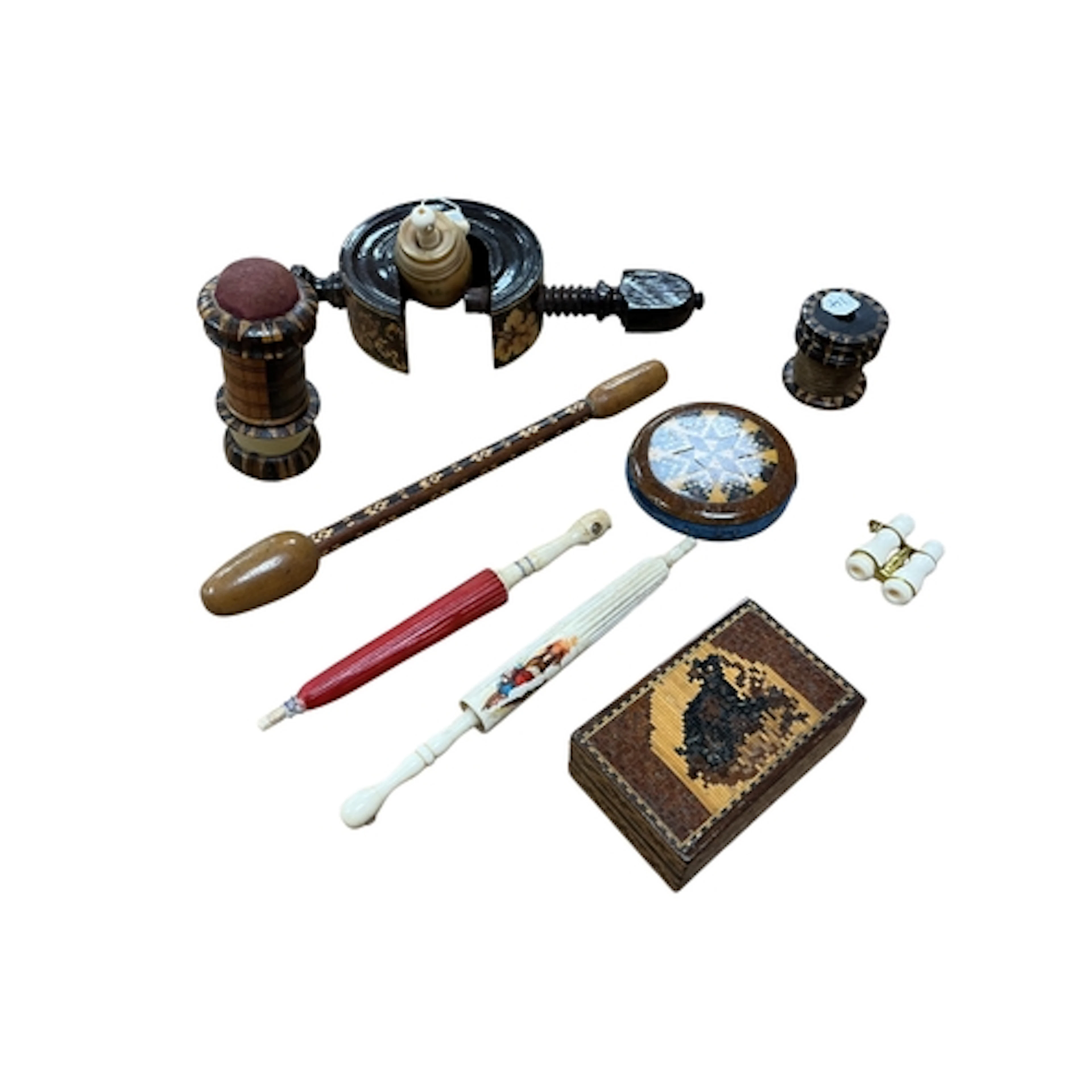 A collection of Tunbridgeware sewing items, clamp pin cushio...