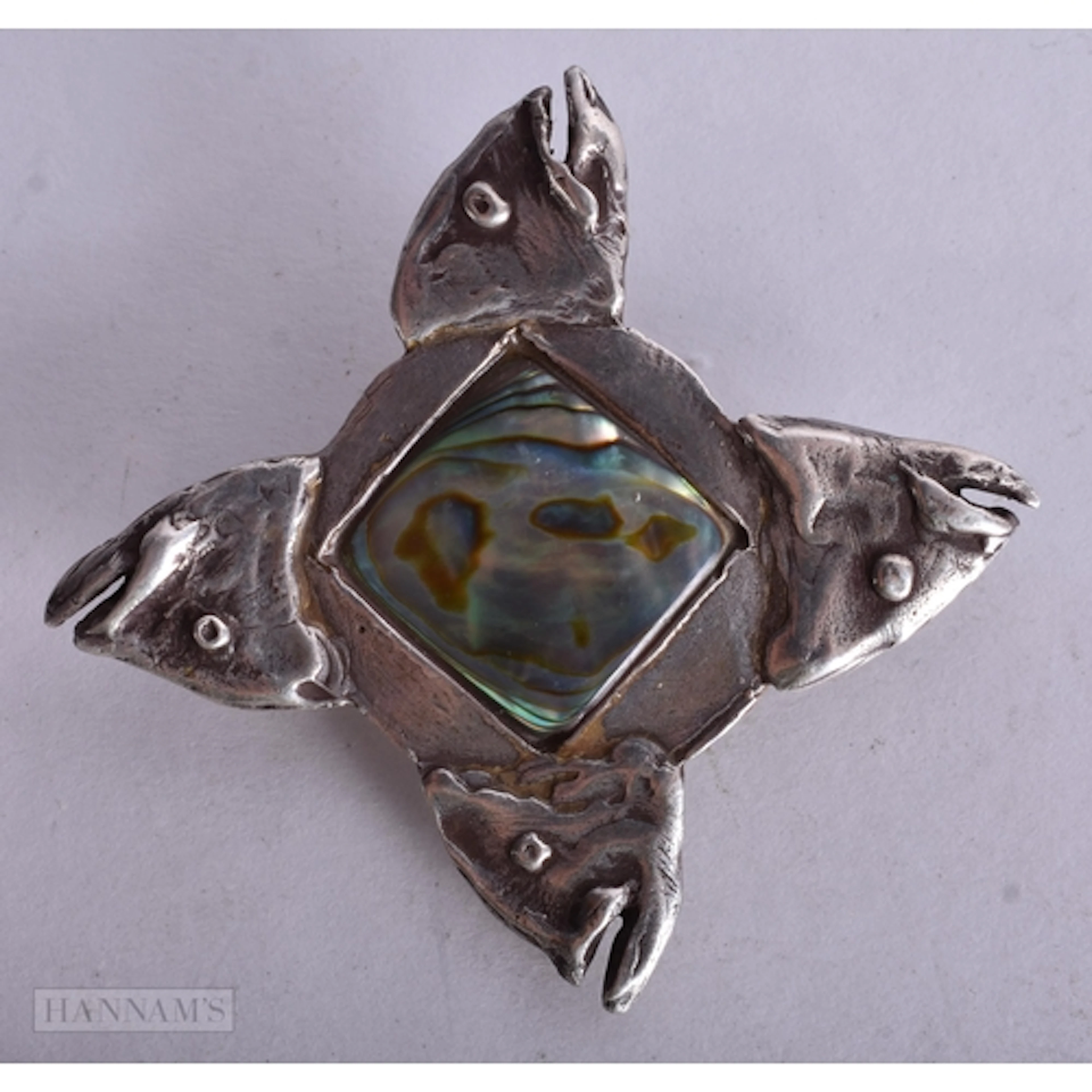 A SILVER AND ABALONE SHELL SALMON BROOCH. 17.3 grams. 5 cm x...