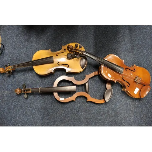 Three students violins.