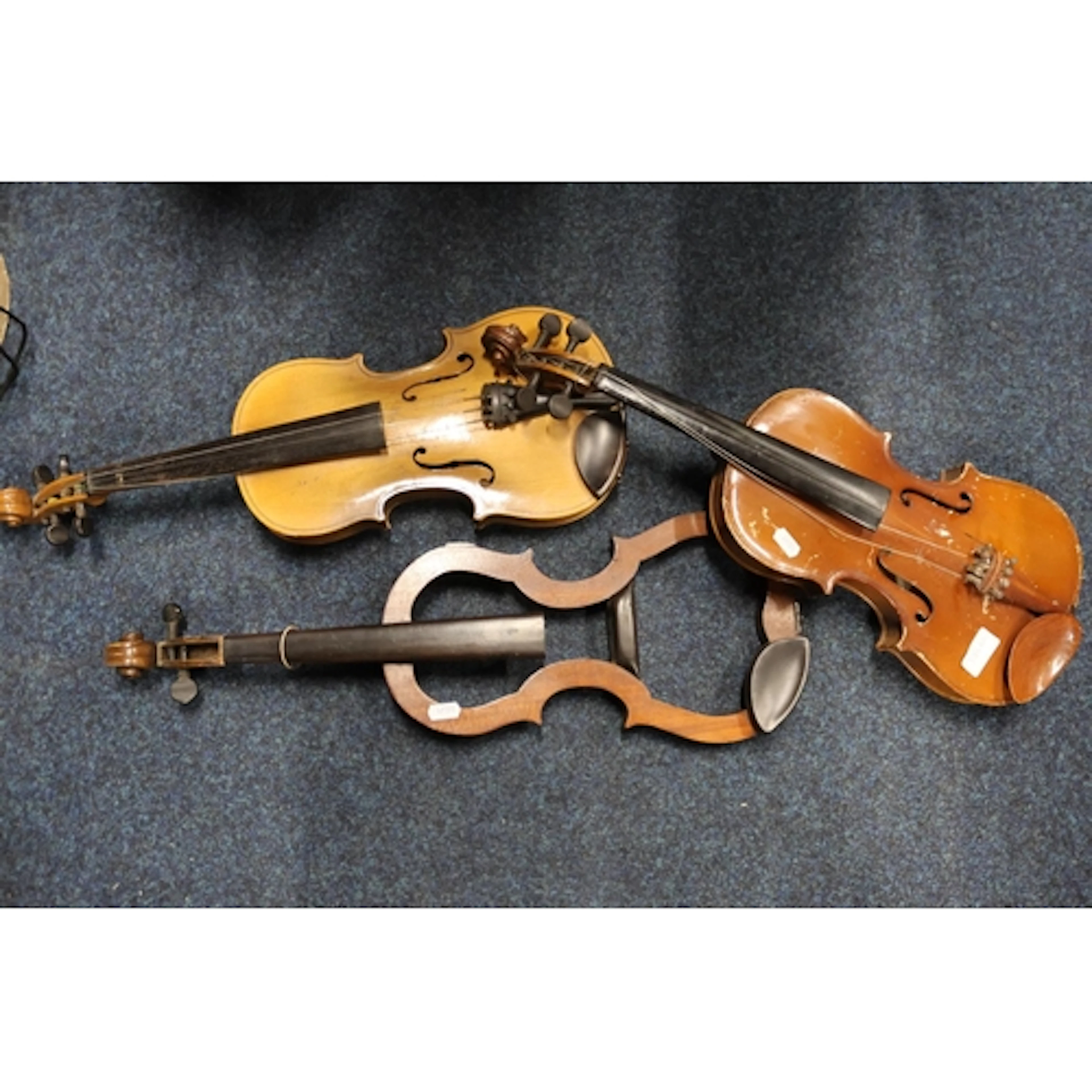 Three students violins.