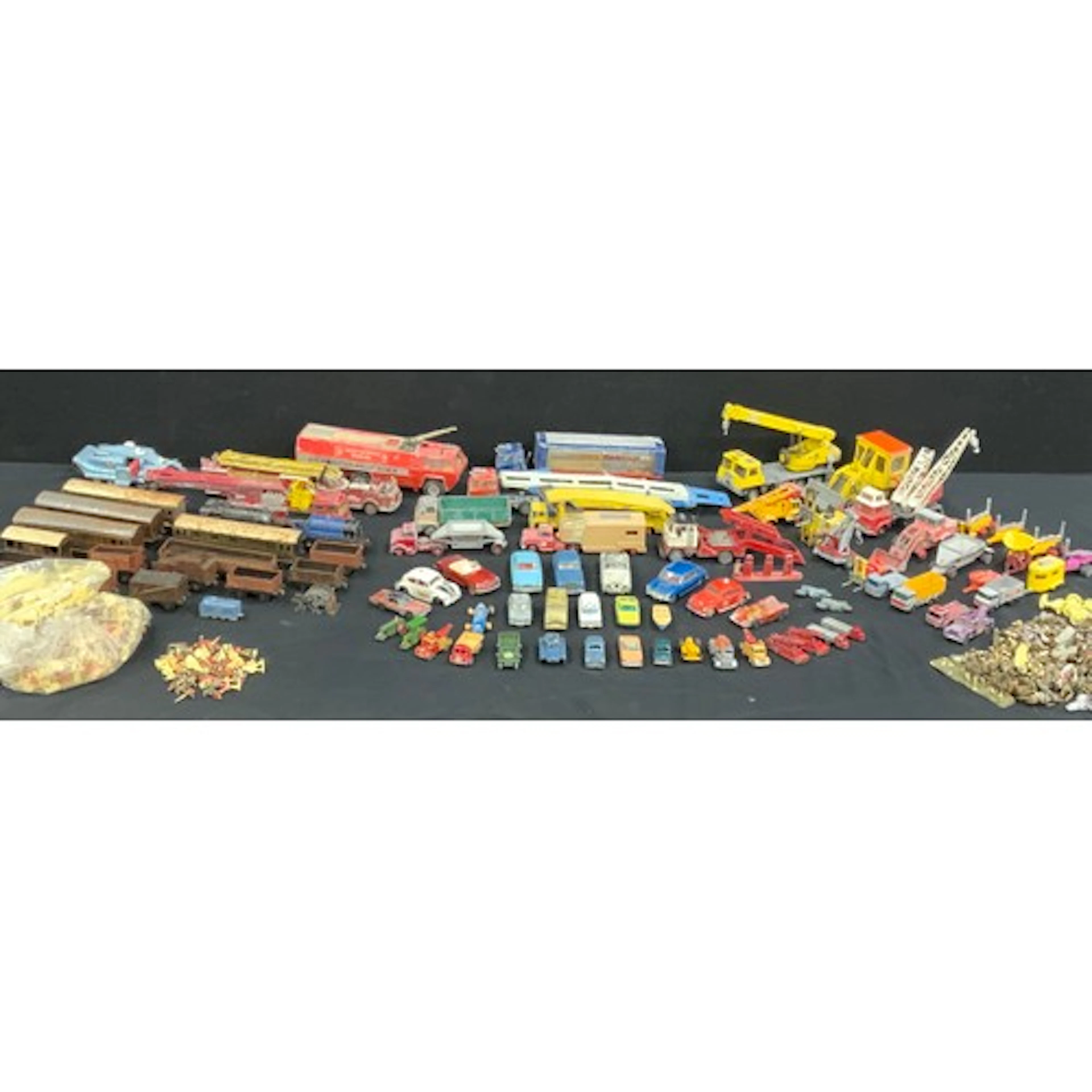 A collection of die cast model Dinky cars including a shovel...