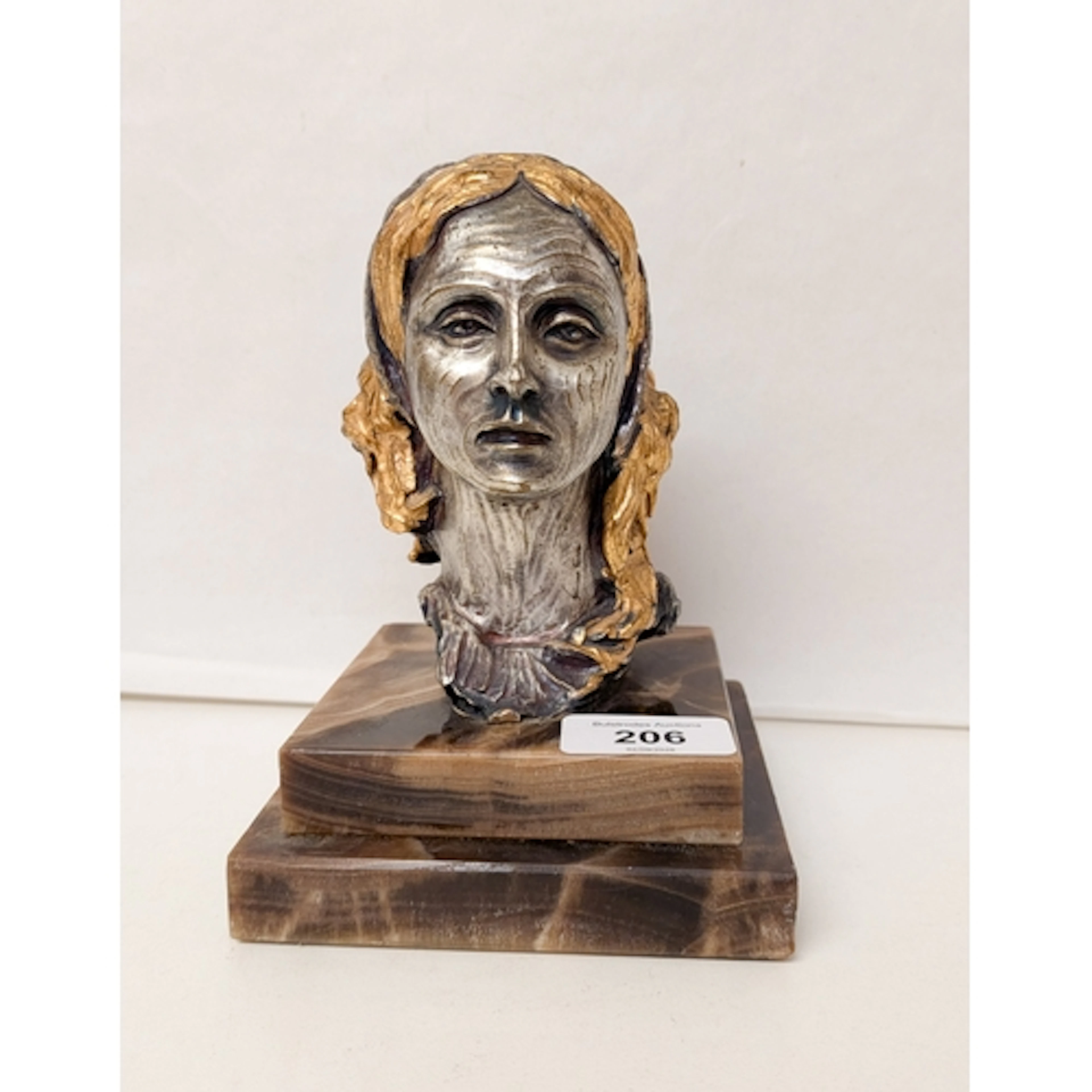 A small Art Nouveau style signed bust of a lady on a square ...