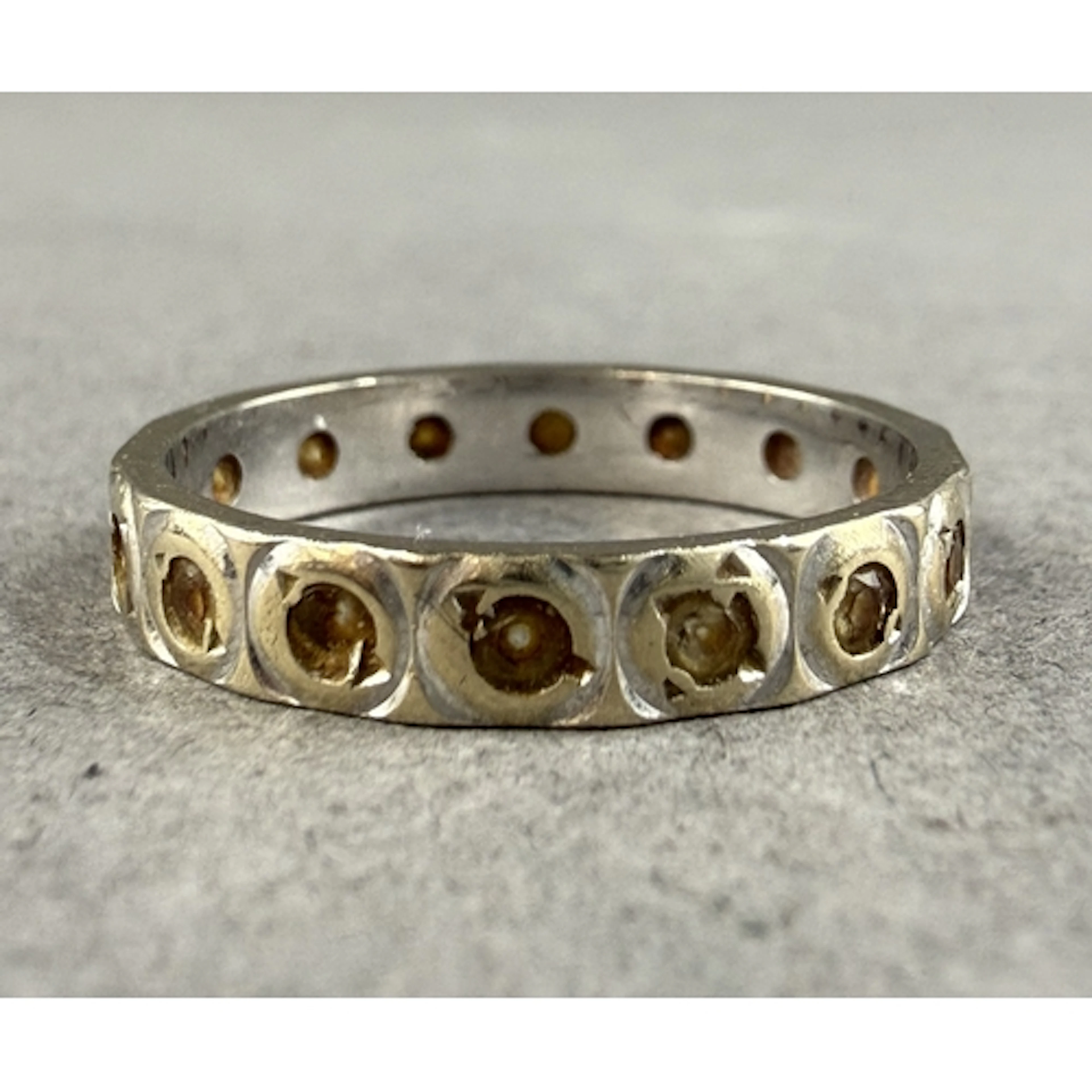 Jewellery: an 18ct white gold eternity ring set with white s...