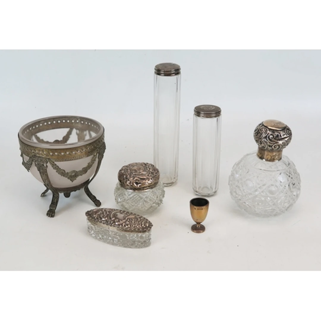 Assorted silver topped dressing table jars, together with a ...