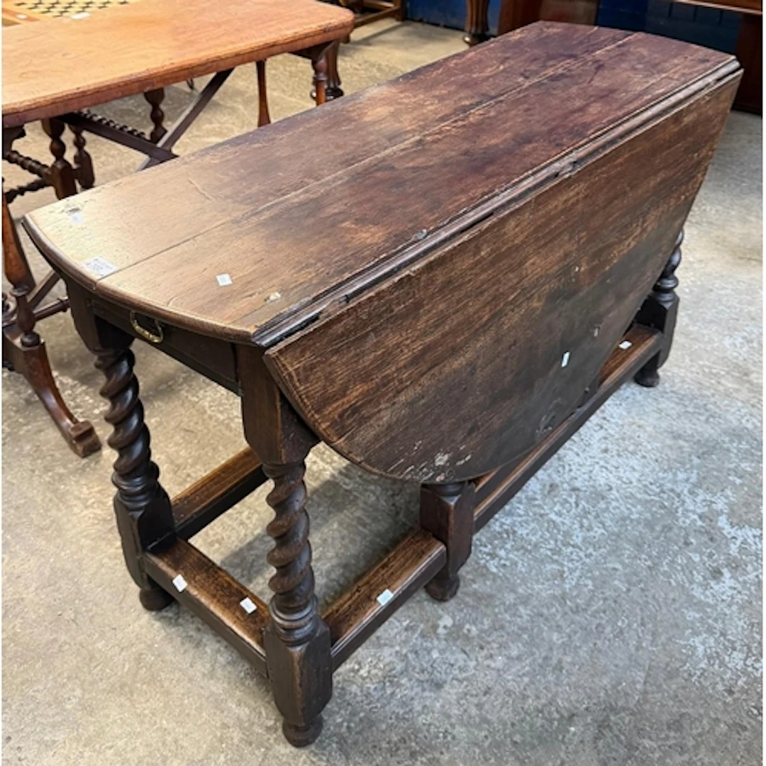 17th century style single drawer gate leg table, having barl...