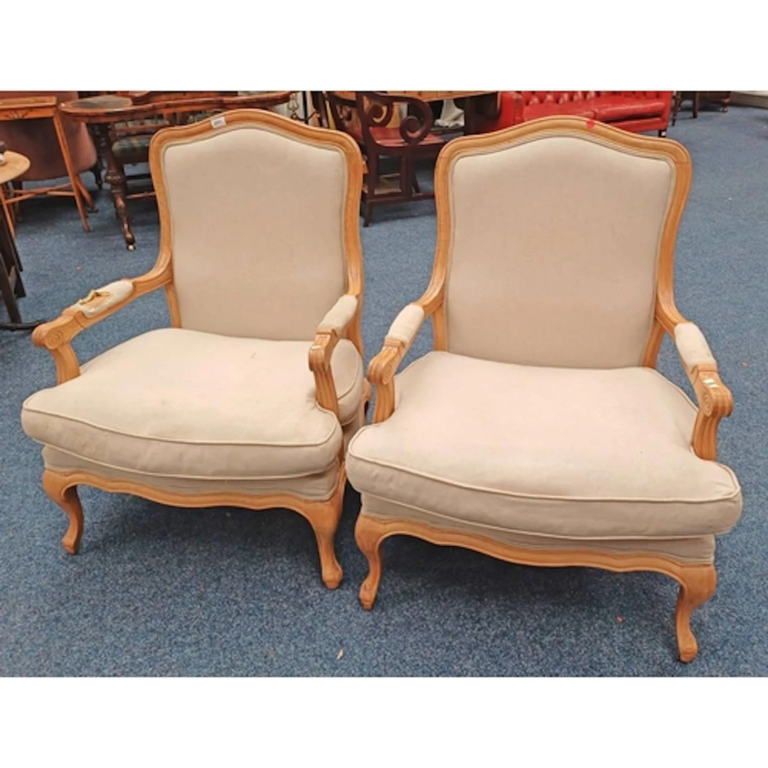 PAIR OF CONTINENTAL OAK FRAMED SCROLL ARMCHAIRS WITH CABRIOL...