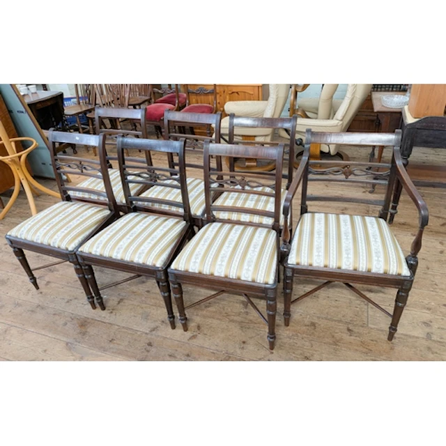 A set of six Regency style mahogany dining room chairs with ...