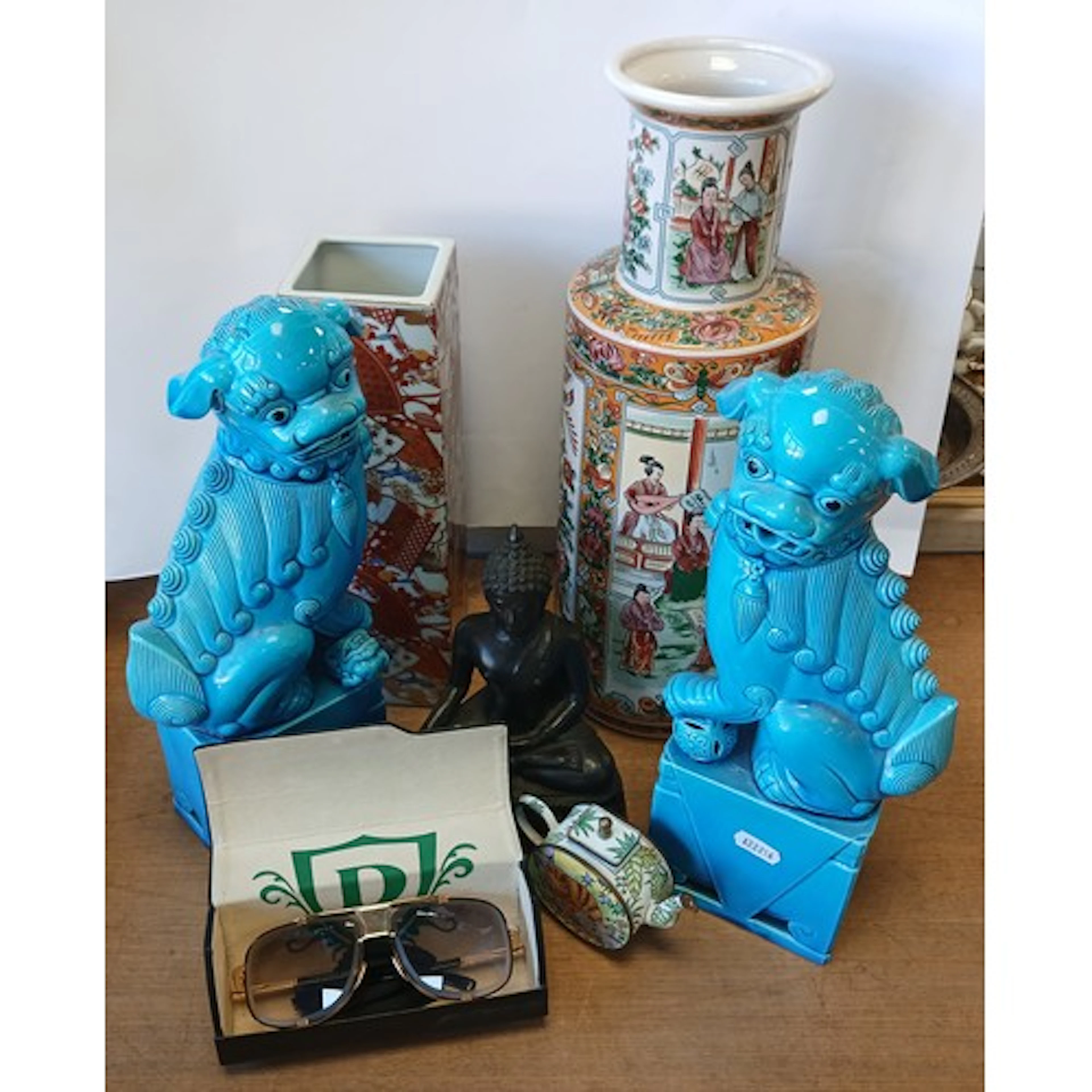 Pair of turquoise lion dogs, miniature enamel teapot, two or...