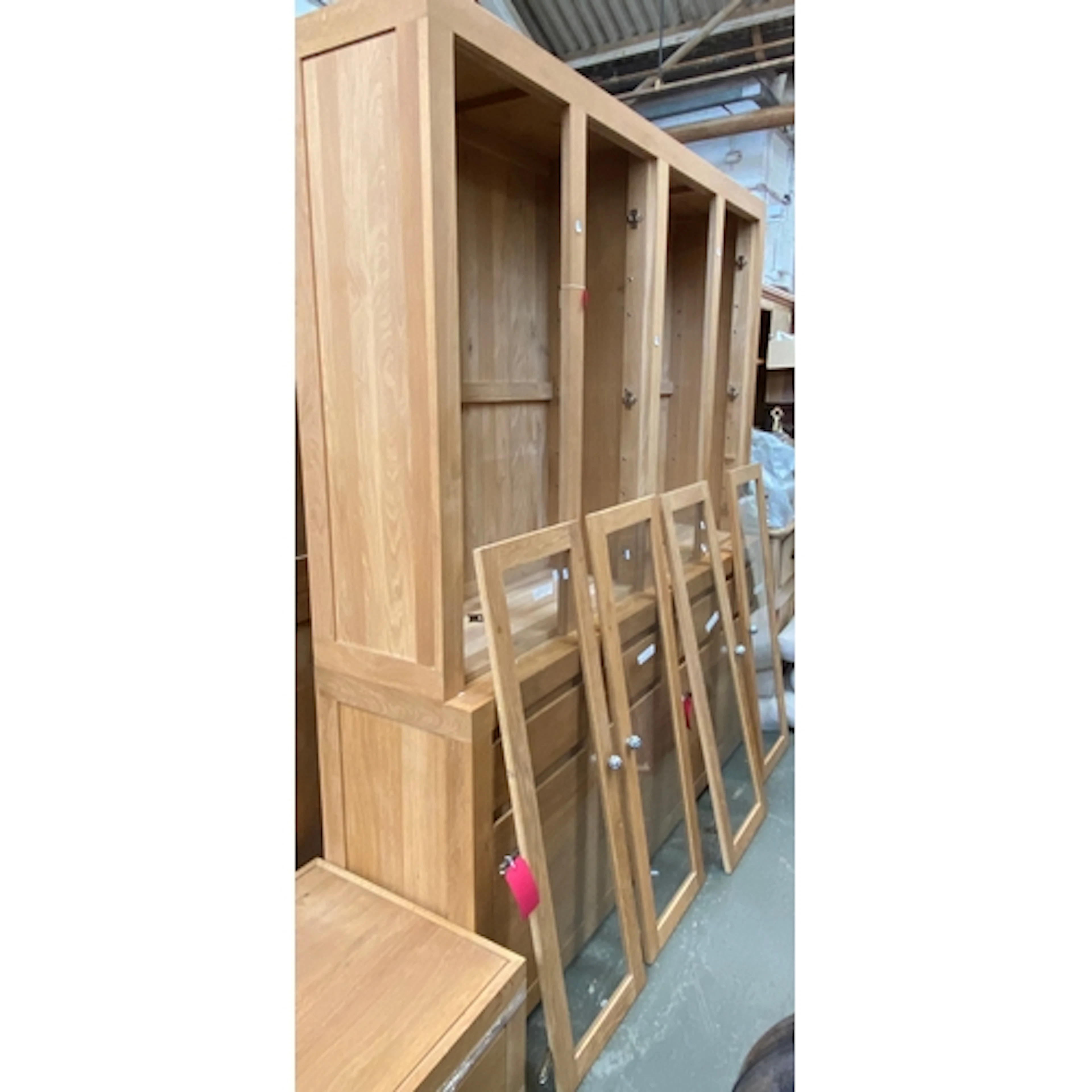 A large modern blonde oak kitchen dresser, well made in the ...
