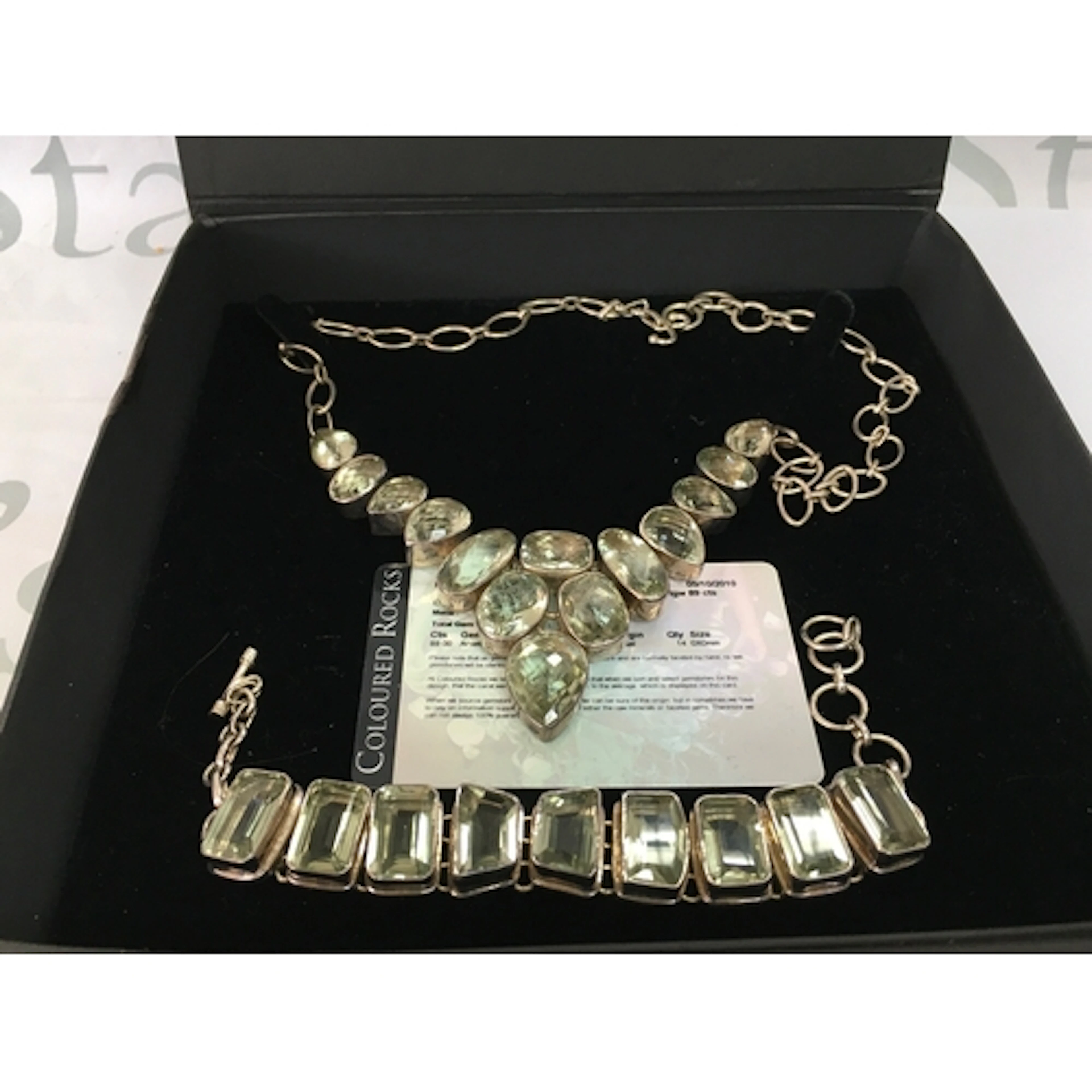 A sterling silver green amethyst necklace and bracelet