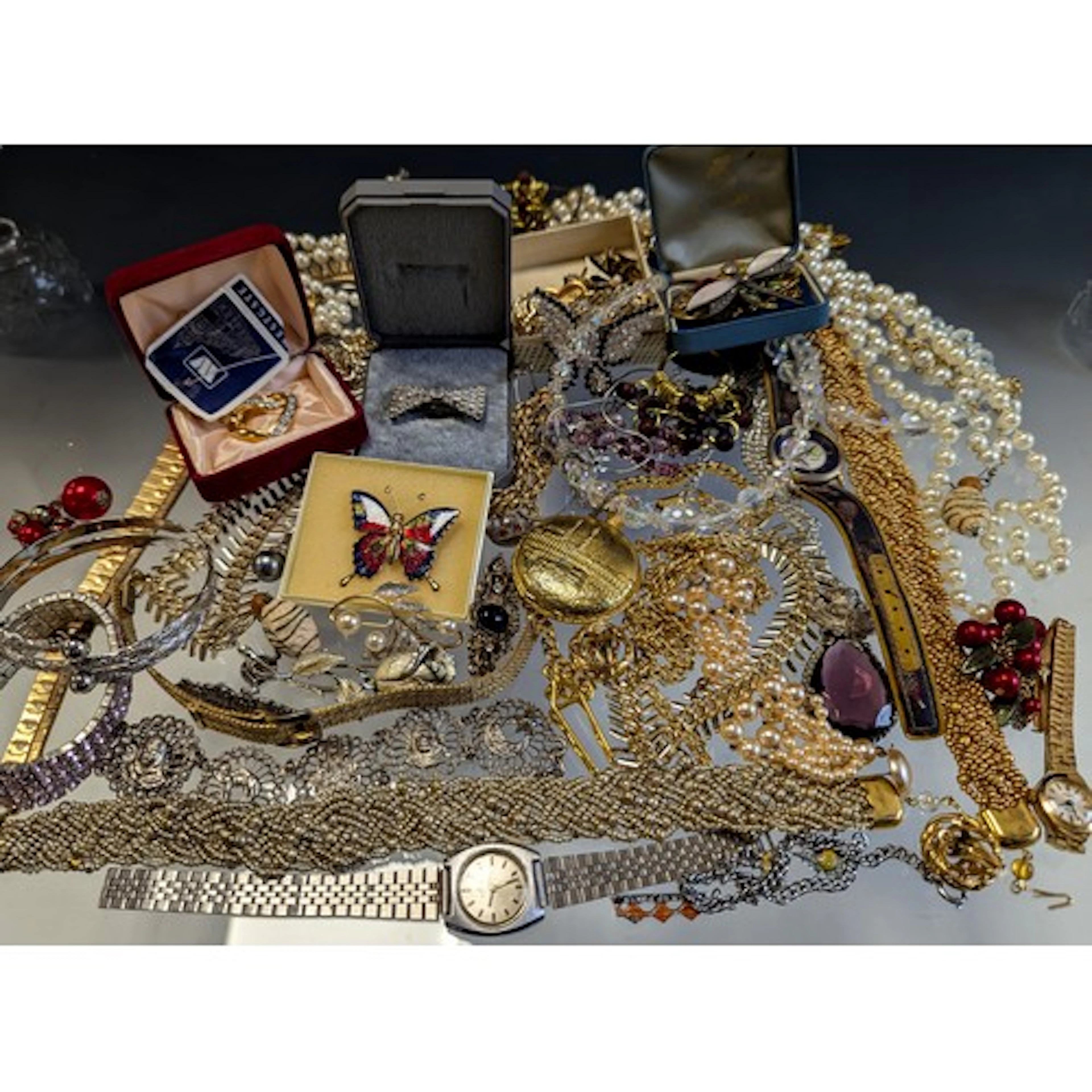 A selection of costume jewellery and watches, the costume je...