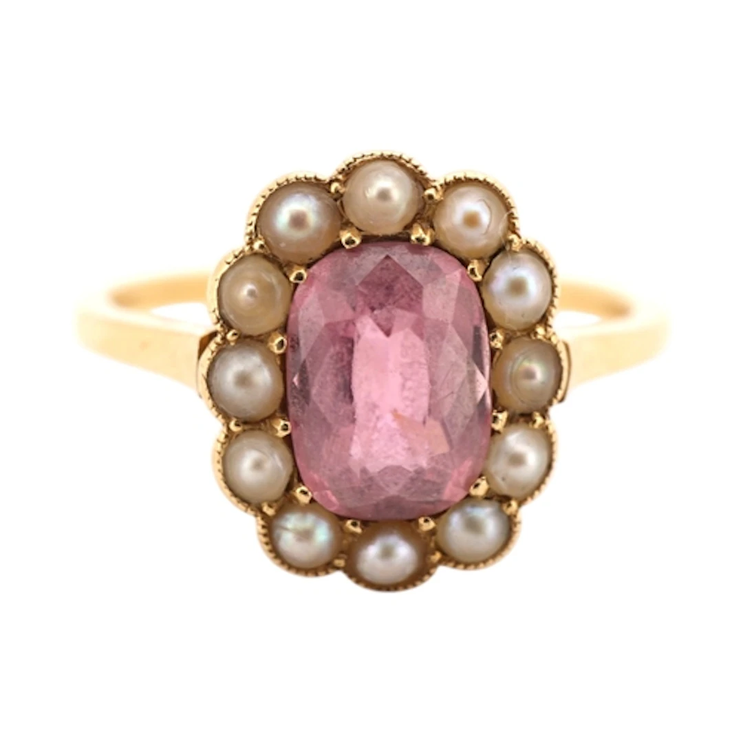 A pink tourmaline and pearl ring, circa 1938, set with an ov...