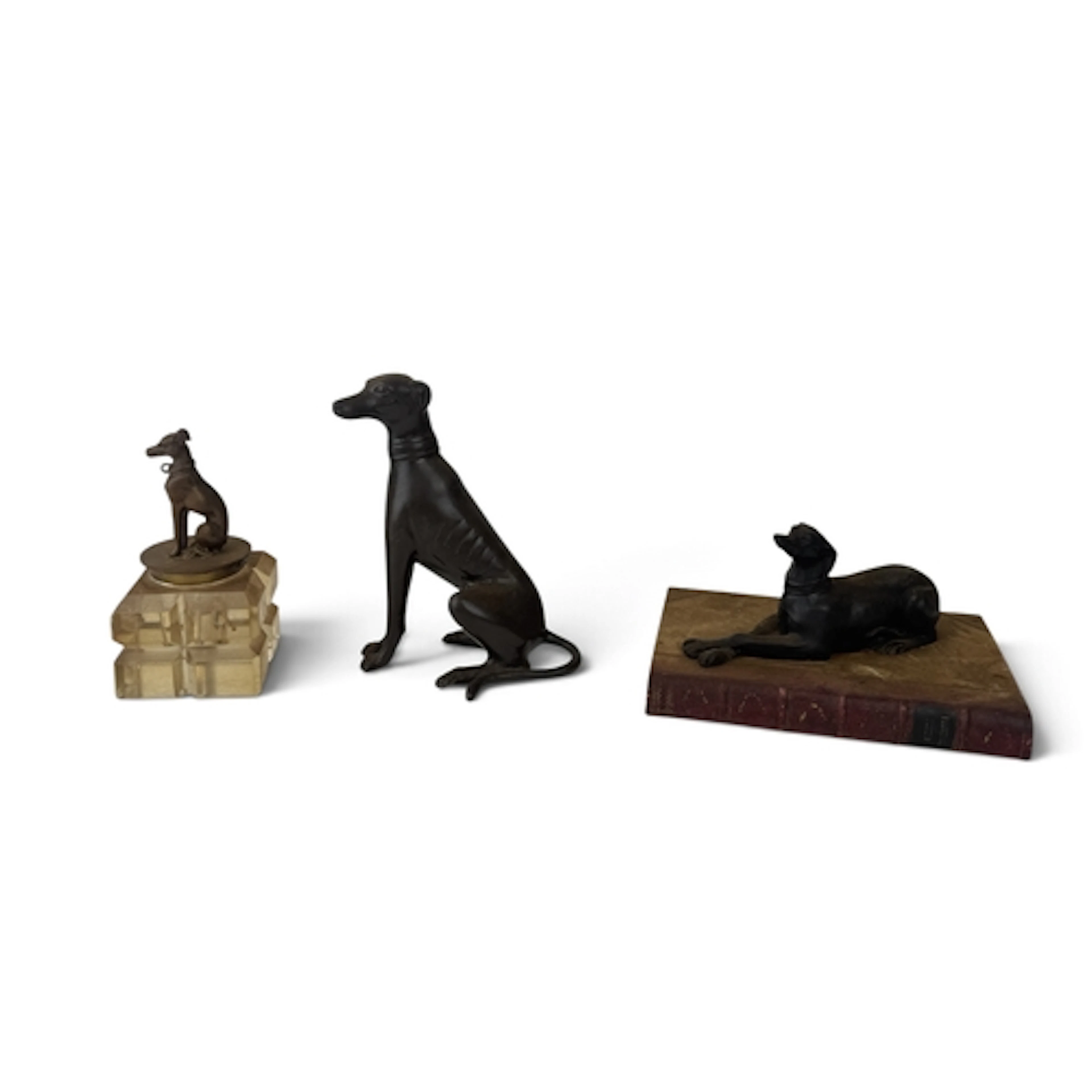 A BRONZE SCULPTURE OF A GREYHOUND 14cm H Together with a dog...