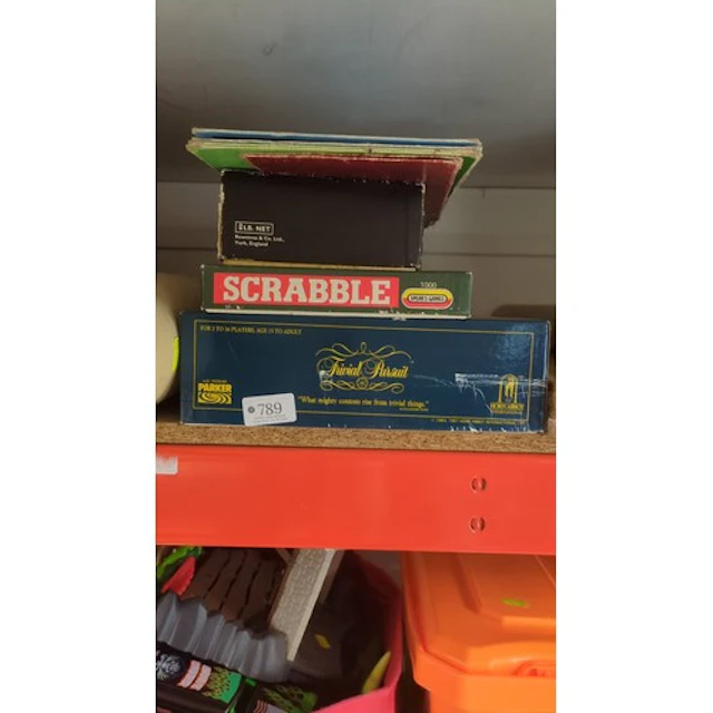 A collection of board and parlour games, including Scrabble,...